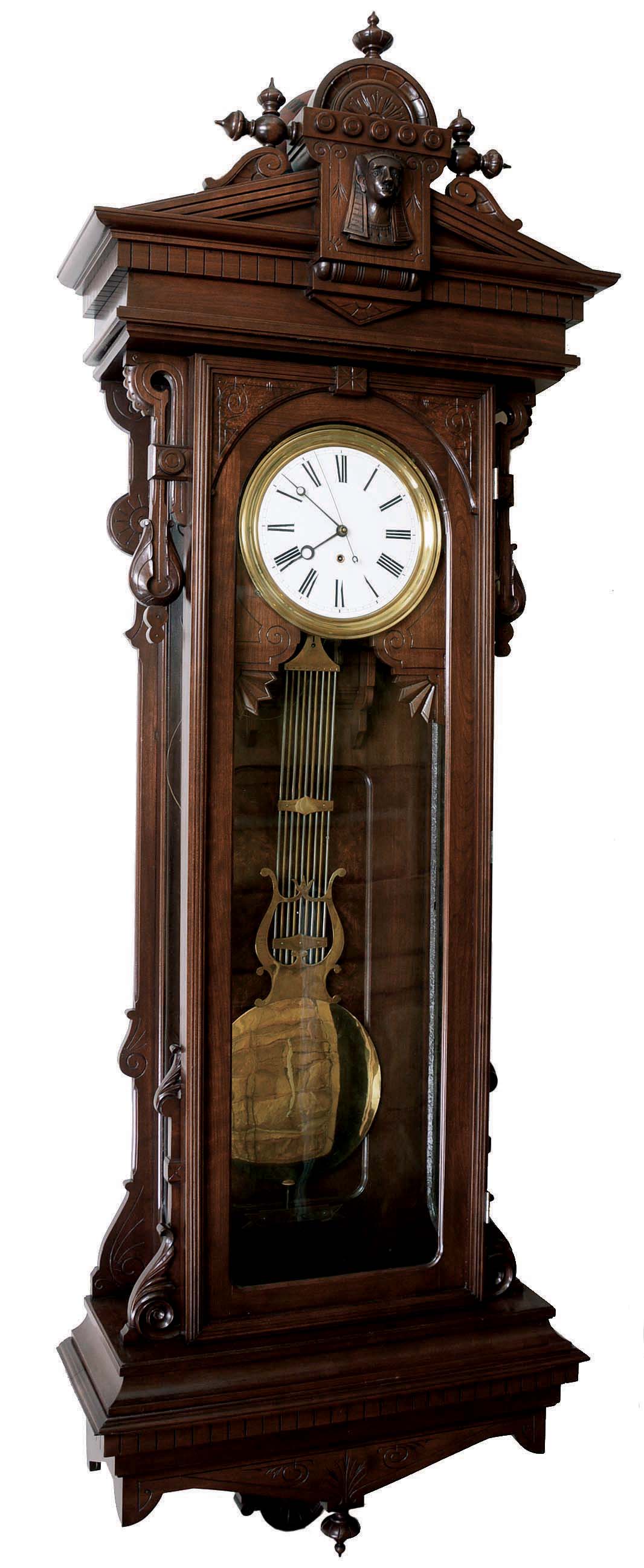 Wm. L. Gilbert Clock Co., Winsted, Conn., "Hanging Regulator No. 8" jeweler's regulator wall clock, 8 day, time only, brass weight driven movement in a walnut case with burled walnut panel and Jenny Lind top with a white enamel dial — Antique Clocks Price Guide