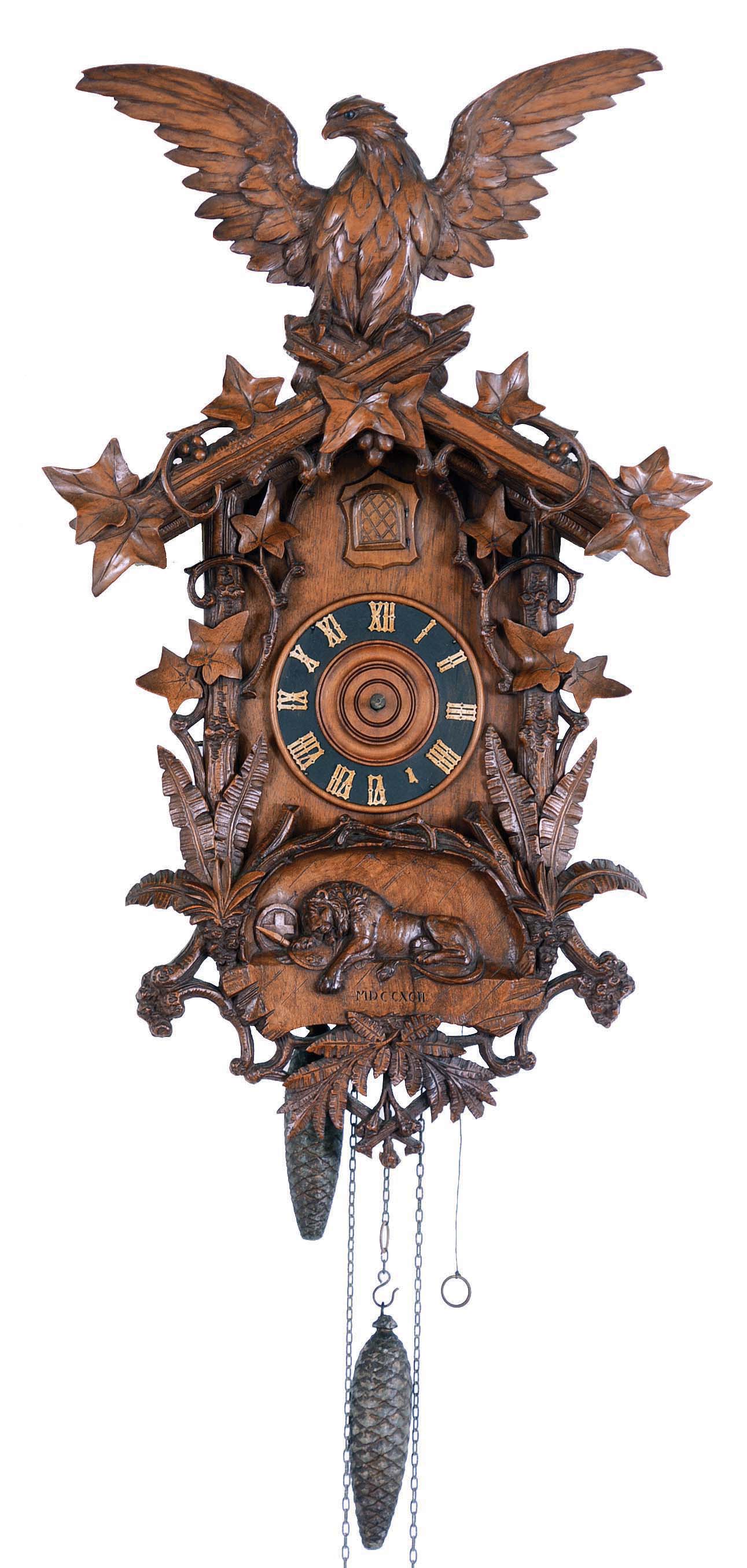 German 30 hours, carved walnut cuckoo clock, "Lion of Lucerne" motif commemorating the 1792 massacre of Swiss guards during the French revolution — Antique Clocks Price Guide
