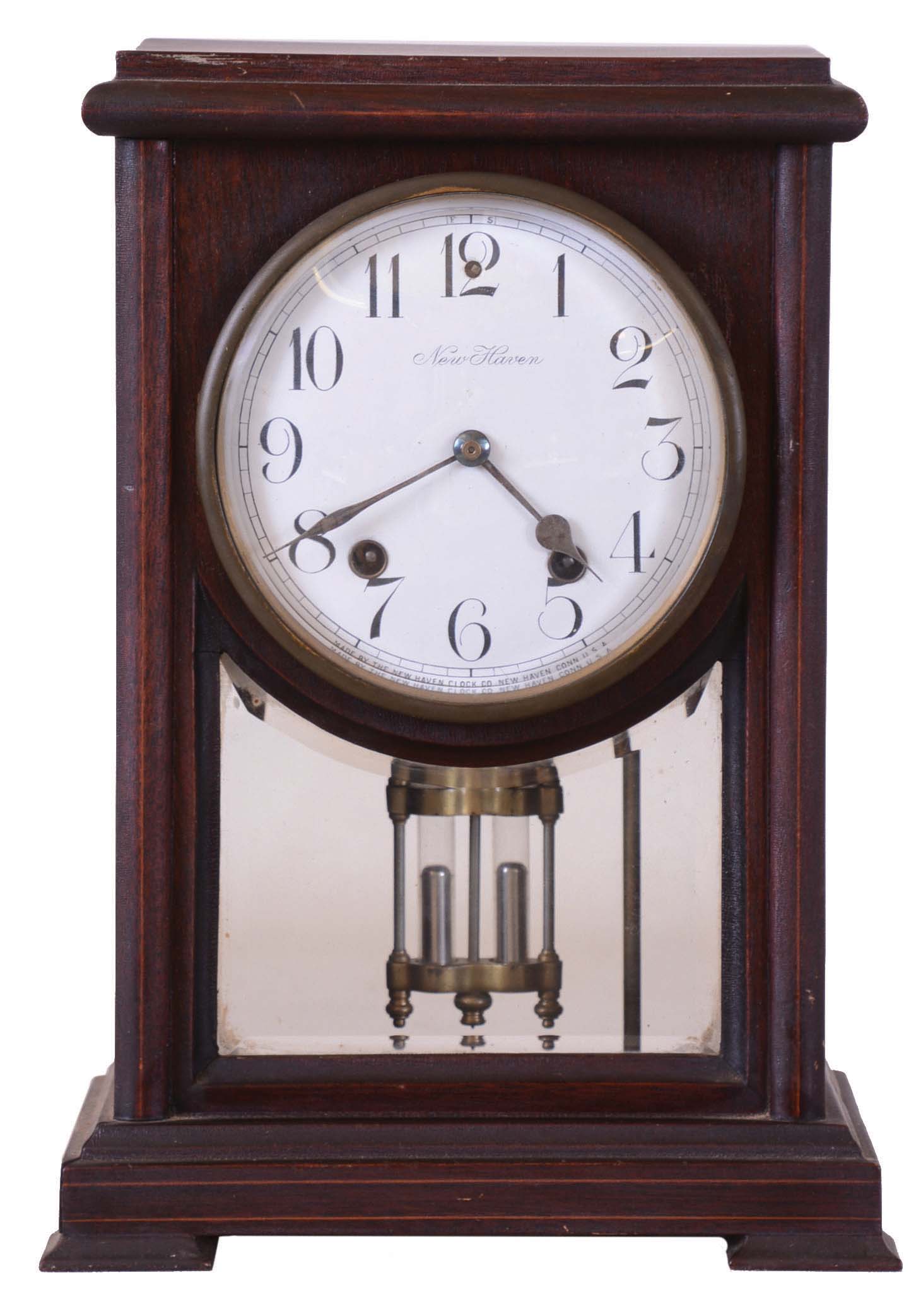 New Haven Clock Co., New Haven, Conn., 8 day, time and strike spring brass movement wood case crystal regulator. We could not find this model in the catalog. — Antique Clocks Price Guide