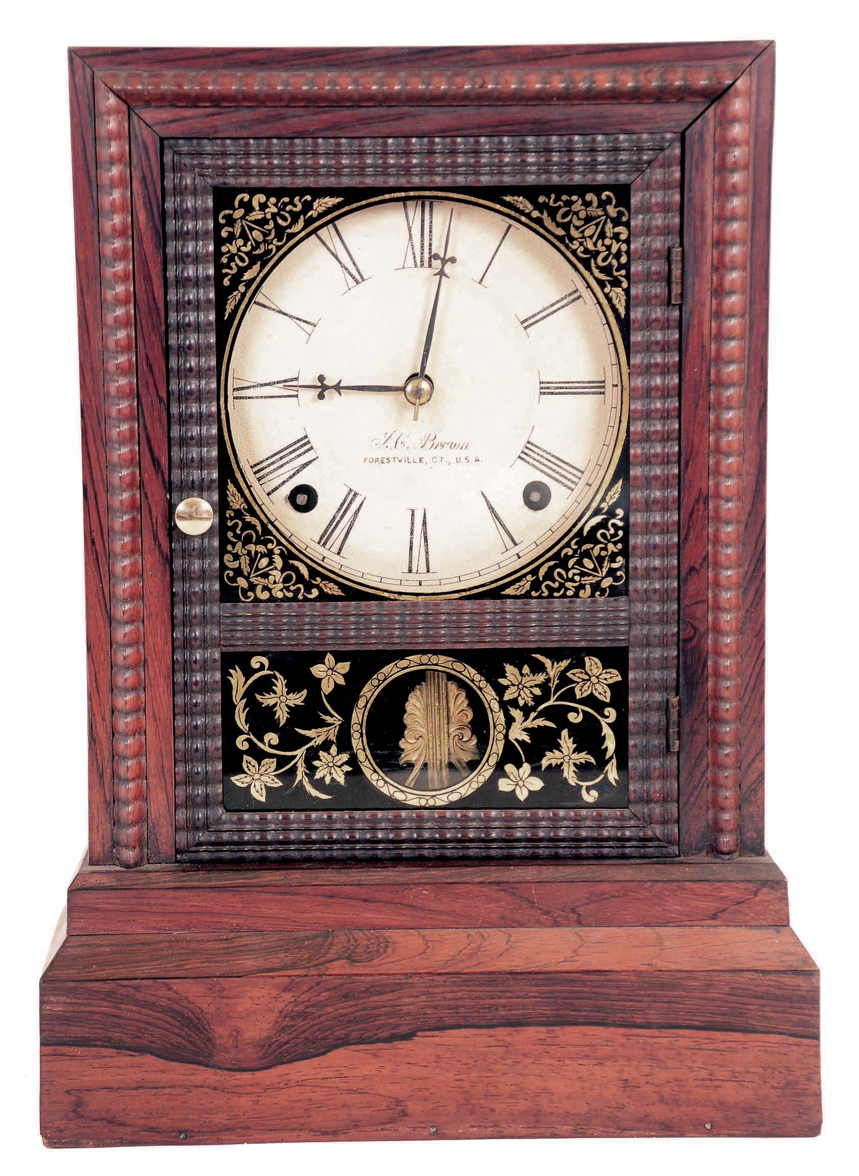 Forestville Mfg. Co., J.C. Brown, Bristol, Conn shelf clock with a spring driven 8 day time and strike movement in a ripple front rosewood veneered cottage-style case. — Antique Clocks Price Guide