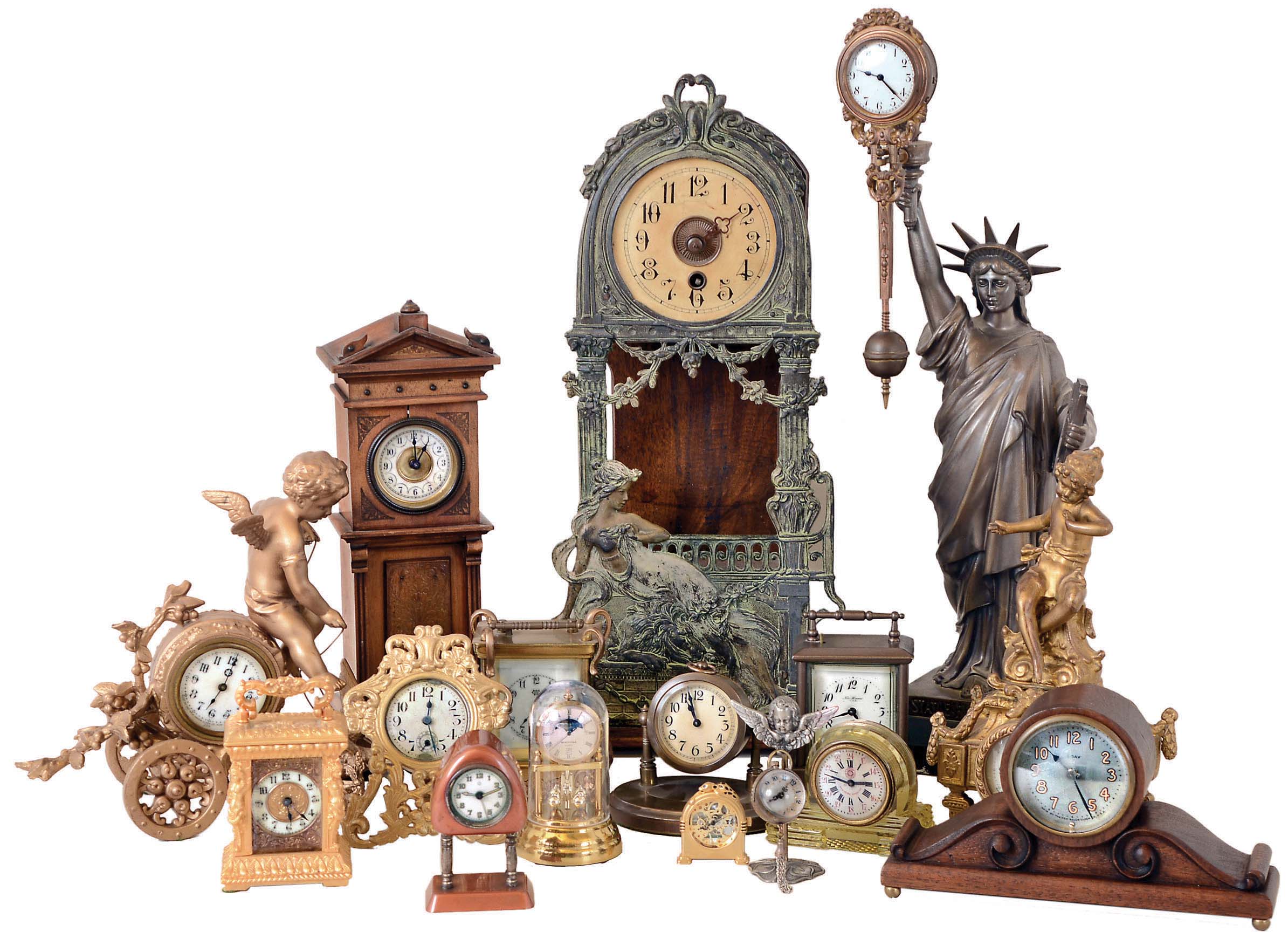 Clocks- 16 (Sixteen) Novelty: assortment of vintage and modern, cast metal and wood, all mechanical except for Horolovar miniature anniversary quartz. Other makers include Waterbury, Junghans, Roskopf, New Haven, etc. The Statue of Liberty swinger has a Junghans-type clock. 20th century — Antique Clocks Price Guide