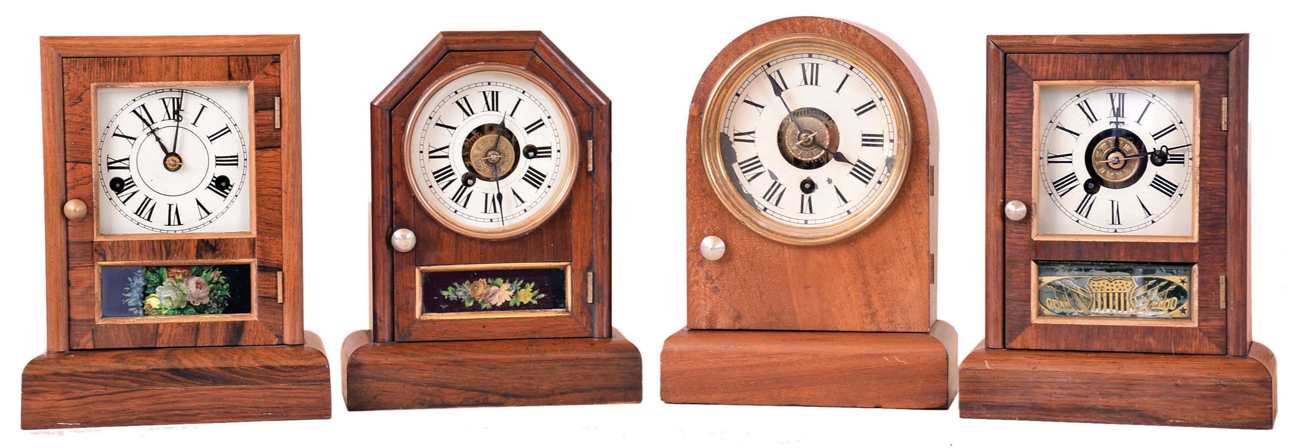 Clocks- 4 (Four): (1) Seth Thomas Clock Co., Thomaston, Conn., 30 hour, time and alarm spring brass movement flat top cottage timepiece. (2) Seth Thomas Clock Co., 30 hour, time and strike flat top spring brass movement cottage clock. (3) Seth Thomas Clock Co., 30 hour, round top time and alarm brass movement cottage timepiece. (4) Seth Thomas Clock Co., 30 hours, time and alarm octagon top spring brass movement cottage timepiece. — Antique Clocks Price Guide