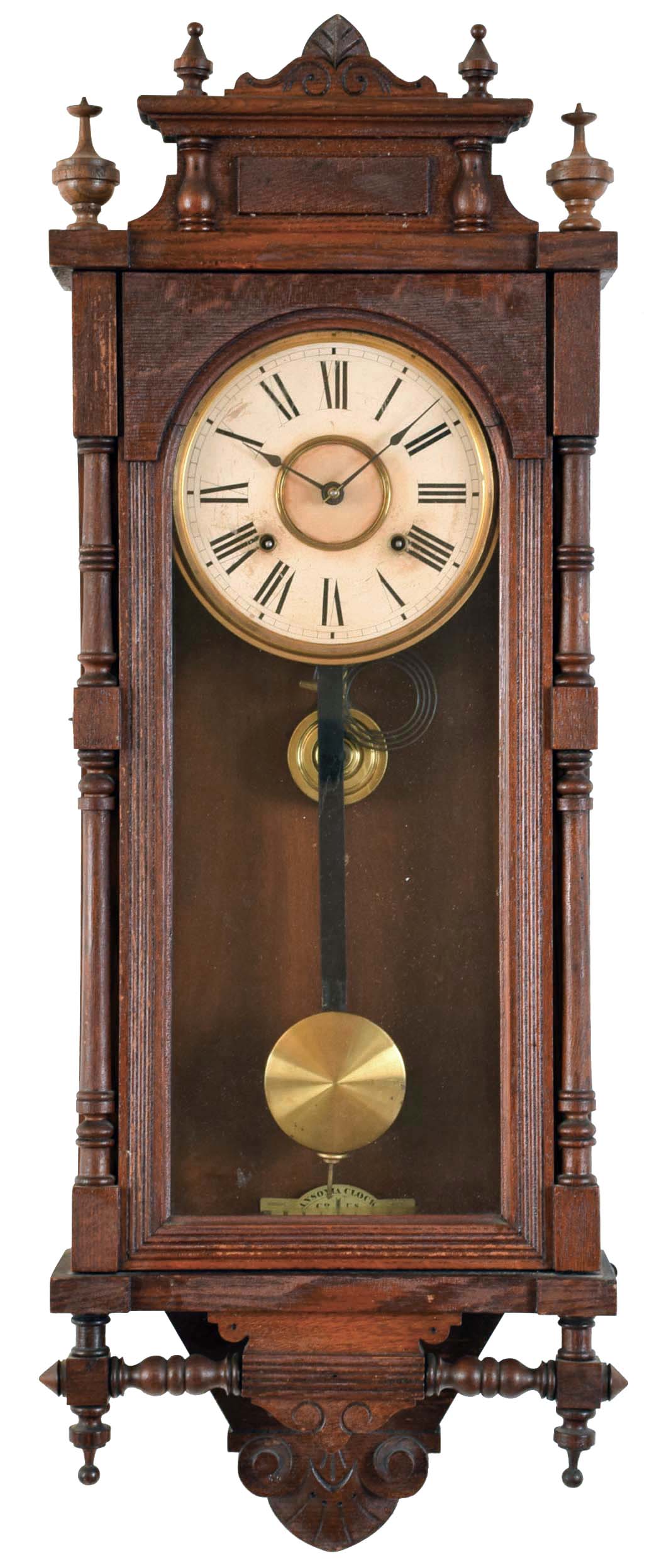 Clocks- 2 (Two): (1) New Haven Clock Co., New Haven, Conn., "Eclipse" wall hanging clock with a spring driven 8 day time and simple calendar movement in a solid oak case and made for the American Wringer Co., 99 Chambers St., NY. c1910. (2) Ansonia Clock Co., New York, NY, "Queen Elizabeth" wall hanging clock with a spring driven 8 day time & half-hour strike movement in an oak case. c1880. — Antique Clocks Price Guide