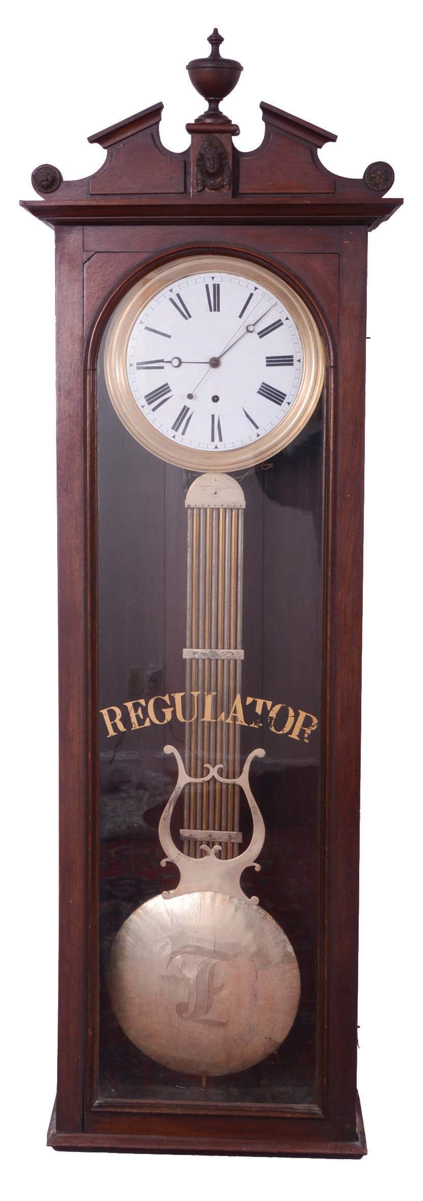Jeweler's regulator wall clock, 8 day, time only, brass weight driven movement with pinwheel escapement and compensated lyre gridiron pendulum in a mahogany case with white enamel dial. — Antique Clocks Price Guide