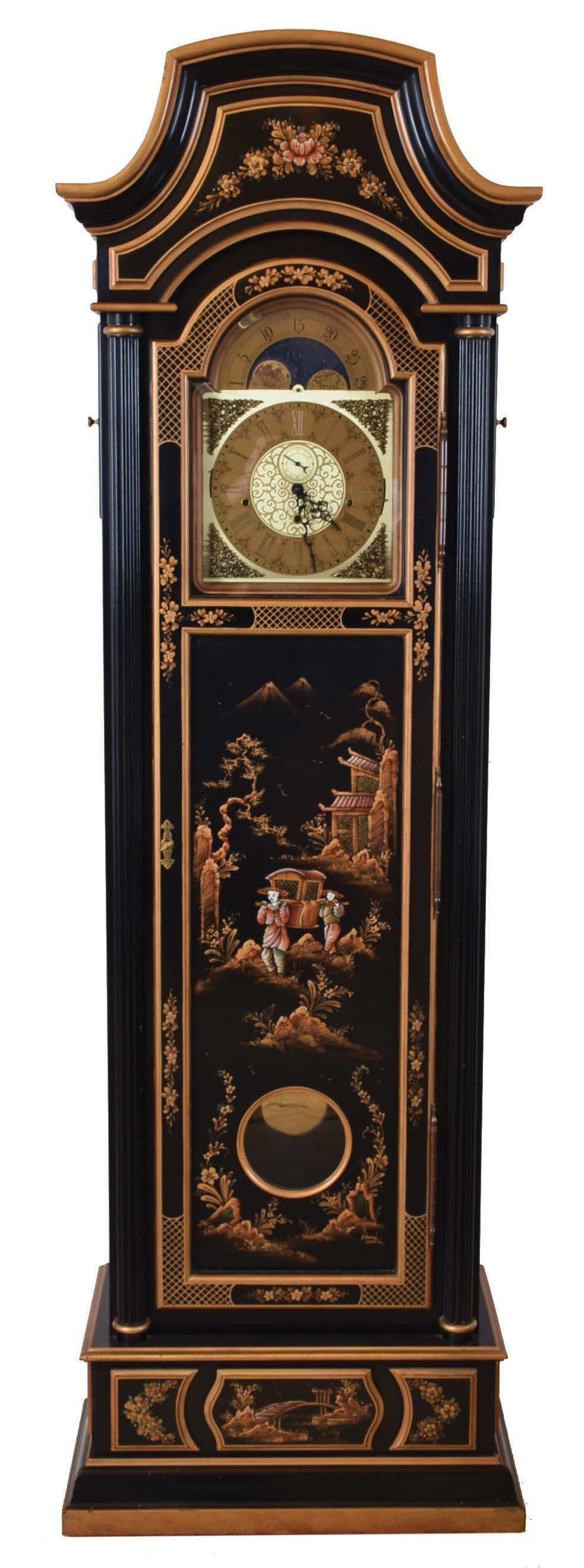 F. Ancher, Germany, tall clock, 8 day, time, strike and chime playing three tunes on gongs, three weight driven movement in a japanned case with maker plate serial #101, with brass dial and tune selector for Whitington, Westminster and St. Michaels tunes. — Antique Clocks Price Guide