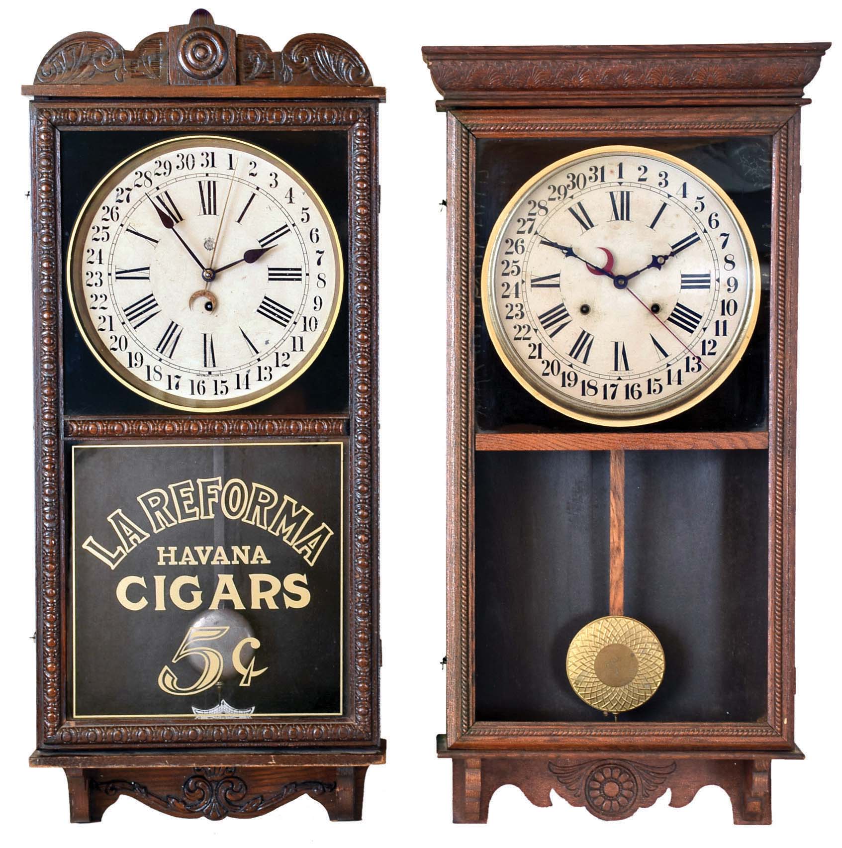 Clocks- 2 (Two): (1) Waterbury Clock Co., Waterbury, Conn., "Crane" wall hanging clock with a spring driven 8 day time and simple calendar movement in a solid oak case., c.1912. (2) Sessions Clock Co., Forestville. Conn., "Regulator H" wall hanging clock with a spring driven 8 day time, strike and simple calendar movement, c1908. — Antique Clocks Price Guide