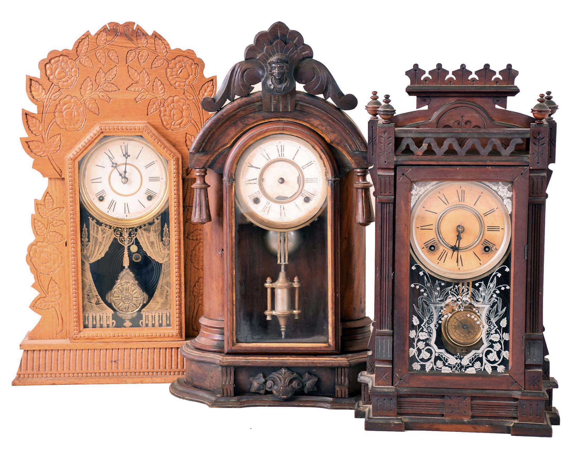 Clocks- 3 (Three): (1) William L. Gilbert Clock Co., Winsted, Conn., "Dacca", 8 day, time and strike spring brass movement shelf clock. c1885 (2) Ansonia Clock Co., New York, 8 day, time and strike spring brass movement shelf clock. c1885 (3) William L. Gilbert Clock Co., Winsted, Conn., "Navy No. 26", 8 day, time and strike spring brass movement pressed oak kitchen clock. c1900 — Antique Clocks Price Guide