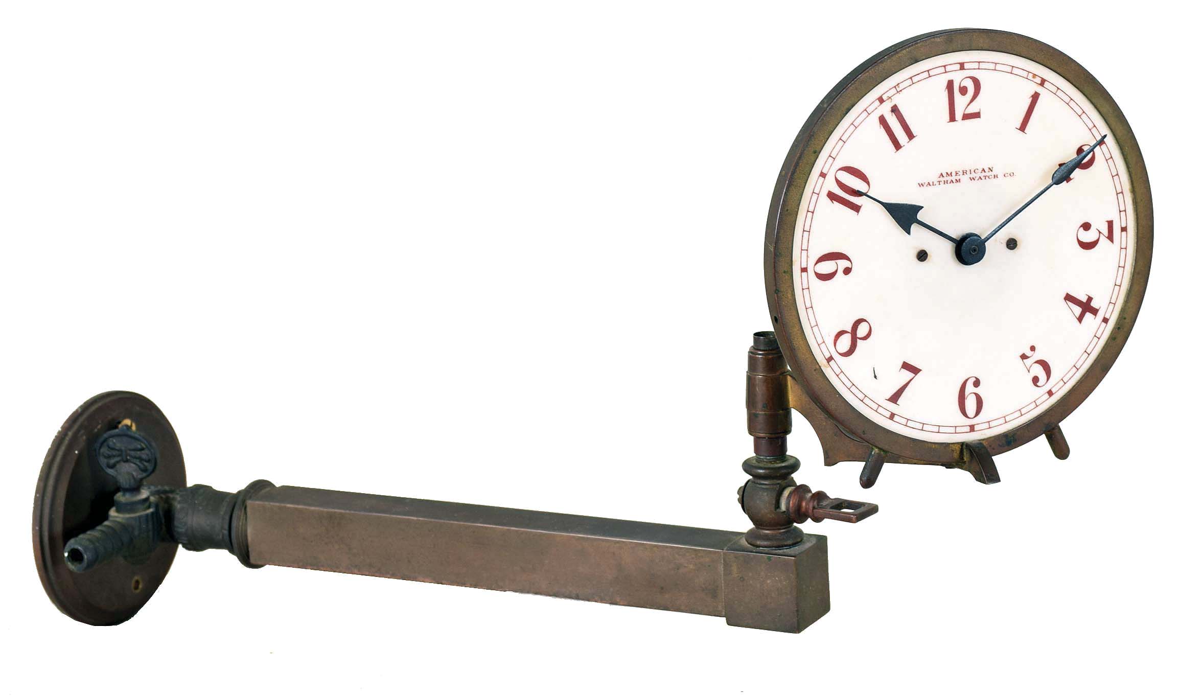 Night clock, white glass Arabic numeral dial signed "American Waltham Watch Co.", blued steel hands, 30 hour Waltham movement, mounted to a patinated bronze gas bracket, the flame illuminating the dial from behind — Antique Clocks Price Guide