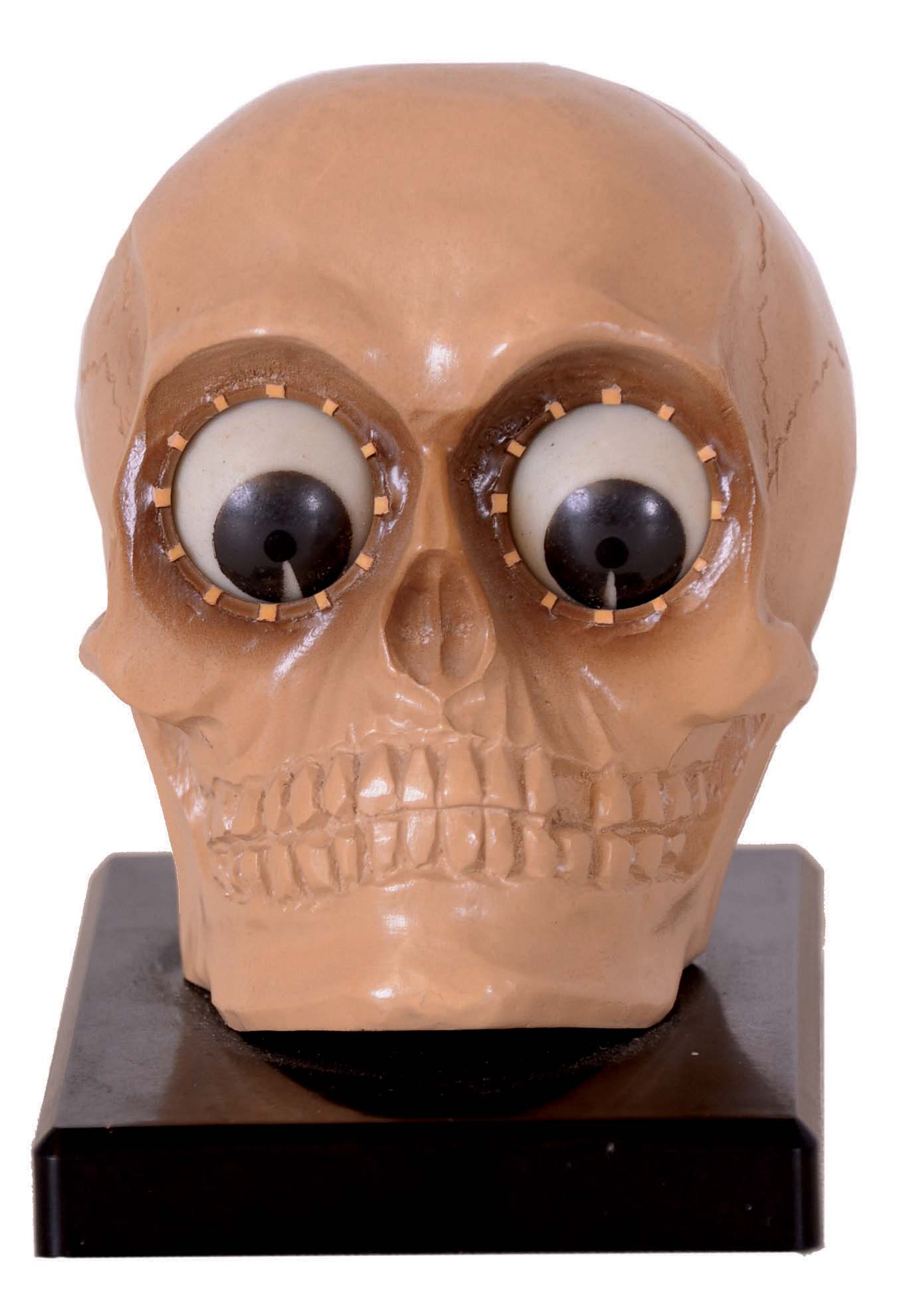 German Oswald "Gesch" skull-form composition 30 hour novelty clock, moving eyes indicate the minutes on one and hours on the other. — Antique Clocks Price Guide