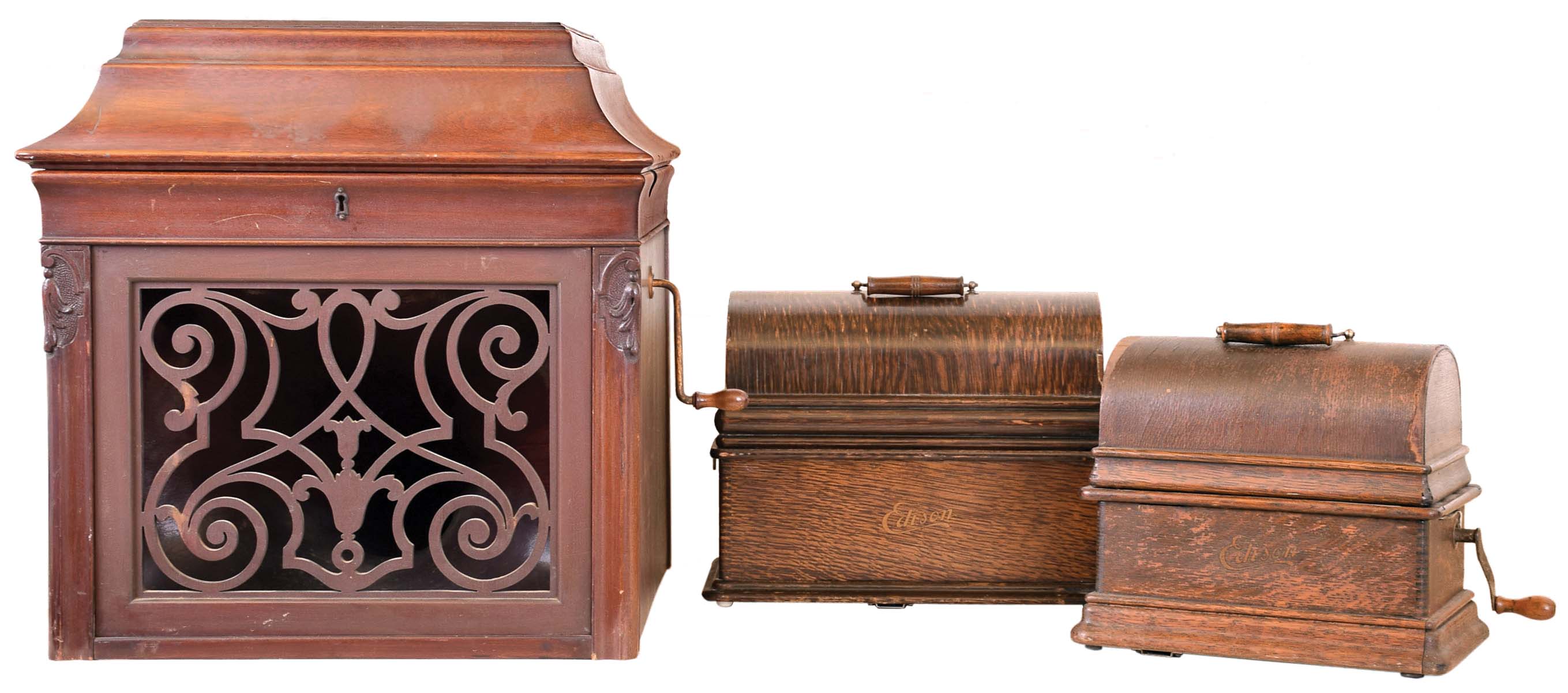 Thomas A. Edison, East Orange, NJ. Three (3) phonographs. (1) A "Home" phonograph with an Edison attachment to allow it to play 2 or 4 minute records. Serial #286360..(2) An Edison "Standard" phonograph, model "E", serial #793827 for playing 2 minute records. (3) An Amberola Model "A", Serial #1633, that plays 2 and 4 minute records in a mahogany case, c1916. — Antique Clocks Price Guide