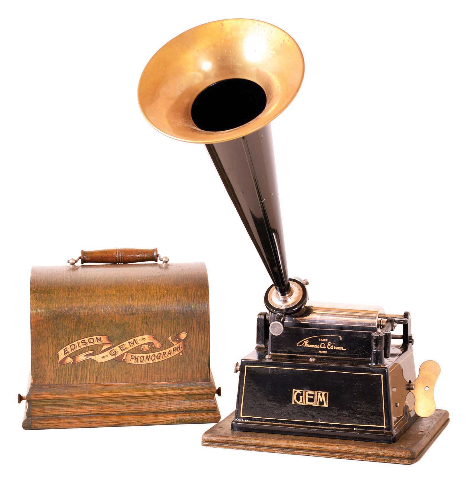 Thomas A. Edison, E. Orange, NJ. "Gem" model 2-minute wax record phonograph, serial #G106224. Included is a reproduction small black painted tin and brass end horn. — Antique Clocks Price Guide