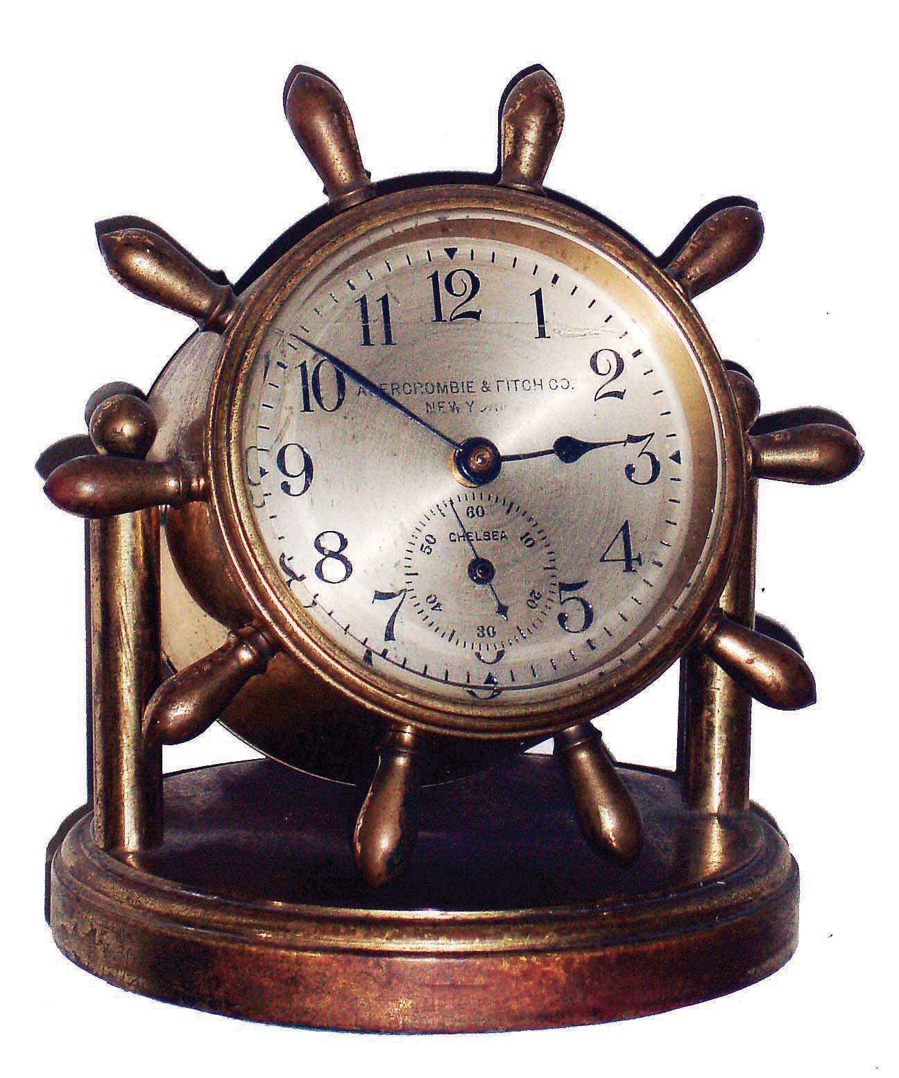 Chelsea Clock Co., Boston, Mass., for Abercrombie & Fitch Co., New York, NY, "Clinton" brass, 8 days, time only swivel head yacht wheel desk clock, 2 3/4" dial, c1930 — Antique Clocks Price Guide