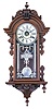 William L. Gilbert Clock Co., Winsted, Conn., "Columbia" wall clock with an 8 day spring driven brass time and strike movement in a walnut case.