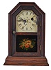 Atkins Clock Co., Bristol, Conn., "Octagon Top" Cottage Clock with a 30 hours spring-driven brass timepiece movement in a rosewood veneered case.