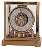 LeCoultre, Switzerland, "Atmos" perpetual gold-plated brass and glass time only mantel clock, serial number 64399