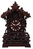 Johann Baptiste Beha, Germany, Black Forest small shelf cuckoo. 8 day wood plate spring-driven movement with double fusees in an elaborately carved case with foliate, vine and fence decoratoins. The wooden dial has Roman numerals and bone hands. This model "No. 509" is illustrated in Justin Miller's book, Appendix A which is the Beha catalogue reprinted.