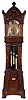 Walter H. Durfee, Providence, Rhode Island, for J.E. Caldwell & Co., Philadelphia, Penn. on dial, 8 tube hall clock, 8 days, time, strike and quarter chimes. three weight driven, damascened movement. Plays Westminster or tunes on "Bow Bells". Tubes signed by Walter Durfee with patent dates 1892 & 1896. The case is carved mahogany with an ornately carved pagoda shaped hood with carved urn finial above dial, bent pyramid top surmounted by a square carved finial at apex. The trunk and hood doors have matching brass escutcheons and beveled glass. The carved curve base resting on bracket feet has a retailer panel with presentation plaque to "GEORGE & LAURA HOLL 1873. JUNE 25TH. 1895". The brass dial has moon phase, engraved spandrels and dial center, silvered chapter ring, strike / silent and tune selector discs. [Note: George Holl, Jr. (1840-1915) and Laura Stockton (1851-1920) were married June 25, 1873 at Camden, NJ and lived the rest of their life there. This clock was a 22nd. anniversary gift.]