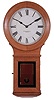 E. Howard & Co., Boston, Mass., "Regulator No. 70" wall hanging clock with a weight driven 8 days timepiece movement in a oak case.