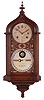 Ithaca Calendar Clock Co., Ithaca, NY, "Hanging Steeple" wall clock with a spring driven 8 days time and strike movement and a perpetual calendar mechanism in a walnut case.
