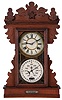Charles W. Feishtinger, Fritztown, Penn., shelf clock with a spring driven 8 days time and strike movement (Waterbury Clock Co.) with a Feishtinger patented (1894) perpetual calendar mechanism in an oak case.