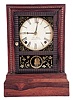 Forestville Mfg. Co., J.C. Brown, Bristol, Conn shelf clock with a spring driven 8 day time and strike movement in a ripple front rosewood veneered cottage-style case.