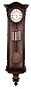 W. Schonberger, in Wien, Austrian 3-weight, Grand Sonnerie wall regulator in a rosewood veneer case with carved and stained accents.