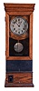 International Time Recording Co., Endicott, New York, punch clock, 8 days, time only, spring driven movement duration in an oak case with a silvered dial. and nickeled pendulum bob.