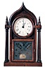 Brewster & Ingrahams, Bristol, CT, 8 day brass spring "Ogee Gothic" or "Onion top" shelf clock with repeating strike and nice cut glass tablet.