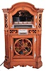 Rudolph Wurlitzer Co., North Tonawanda, NY. Model 780 was the only Wurlitzer juke box in a maple wooden cabinet which looked like a piece of furniture. The lower case features a wooden "Wagon Wheel" with a decorative quilt pattern behind it. This machine holds twelve 78 rpm records with 24 selections. Service manual included.