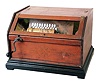Chautauqua wooden cob roller oregan with 29 notes. Stencil decorated mahogany case with eboned base. Has three or four cobs included.