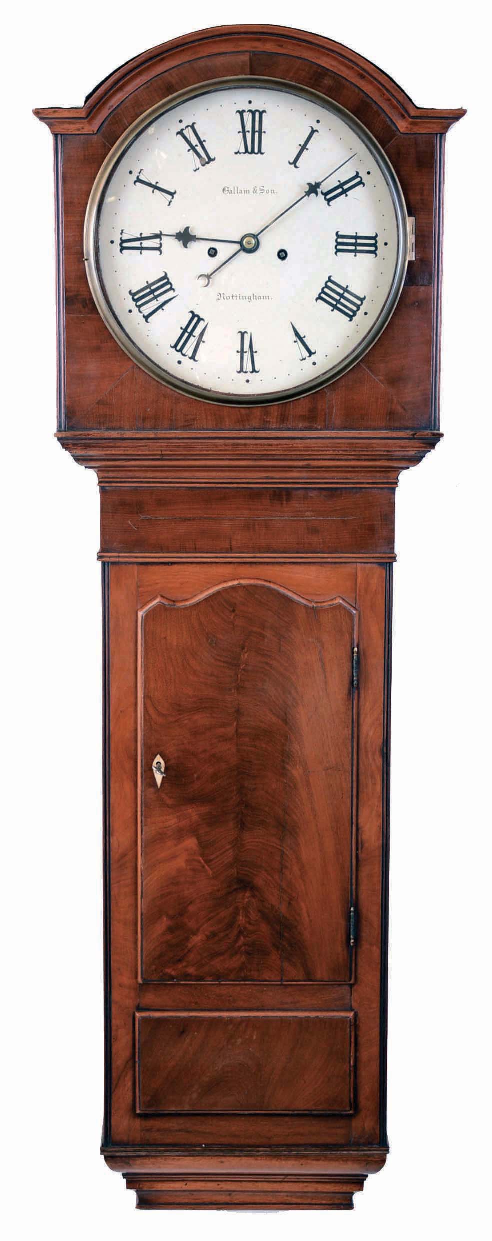 Gallam and Sons, Nottingham, England, tavern wall clock, 8 days, time and bell strike, weight driven movement in a mahogany veneer case with crotch mahogany door and painted metal dial — Antique Clocks Price Guide