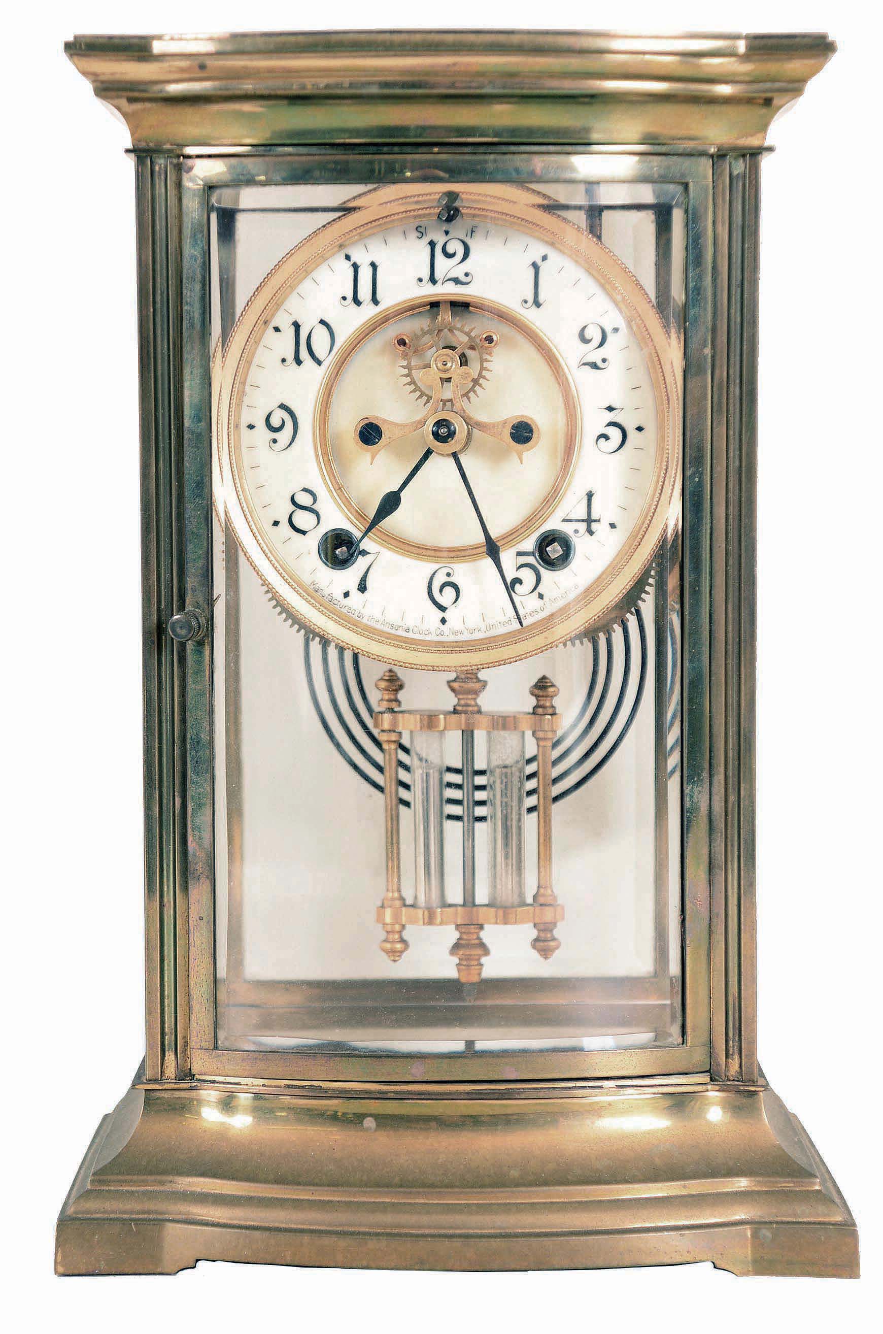 Ansonia Clock Co., New York, NY, "Roy" model Crystal Regulator shelf clock with a spring driven 8 days time and half hour strike movement with a visible escapement. — Antique Clocks Price Guide