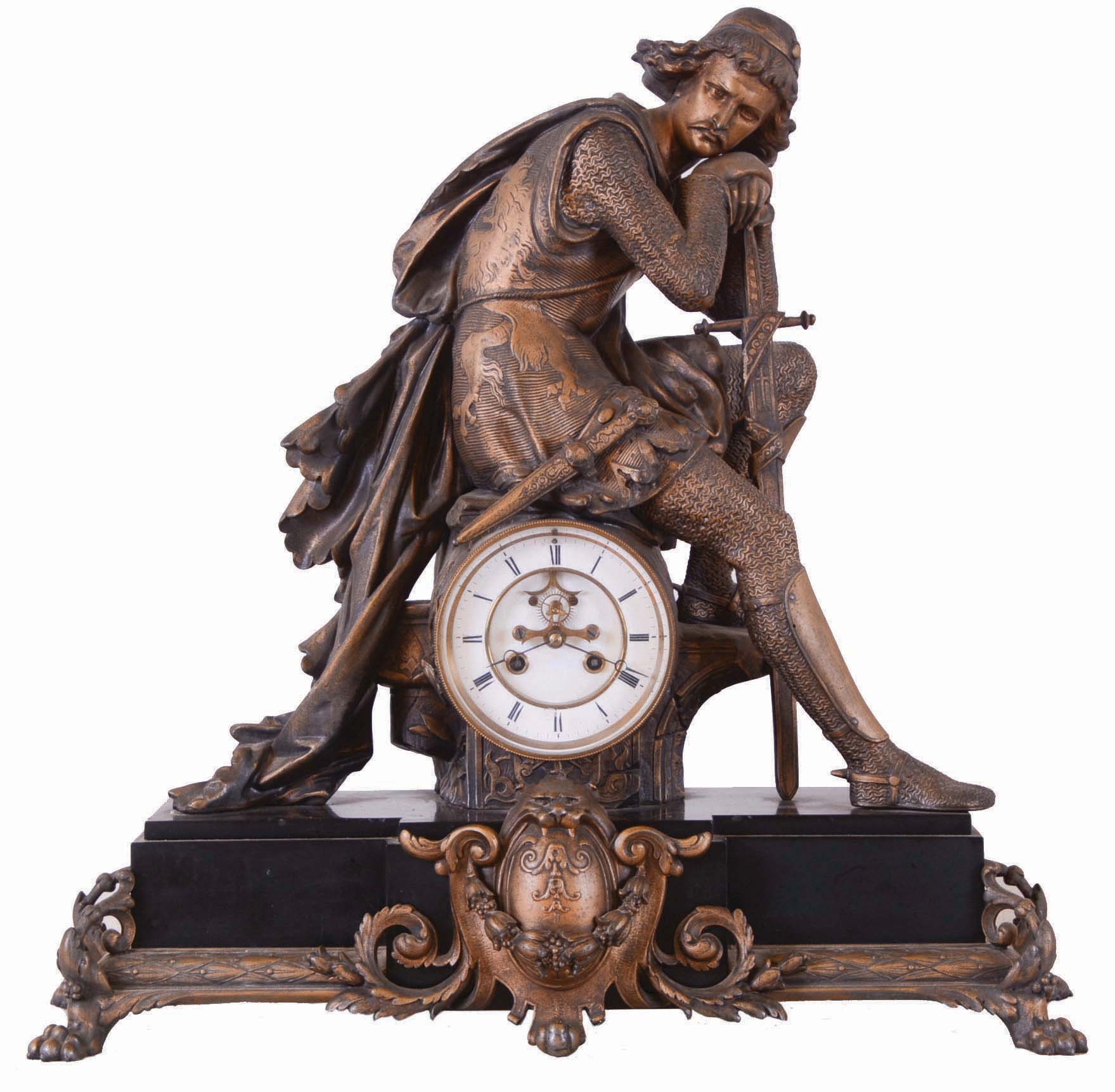France, a large figural mantel clock, stepped black slate base with bronzed paw feet, laurel molding, and central cartouche with lion mask, supporting the clock case with seated, pensive knight in chain mail and with his sword and dagger, also in a bronze finish, two piece Roman numeral white enamel dial with exposed Brocot escapement, blued steel Breguet style hands, and 8 day time and strike pendule de Paris movement — Antique Clocks Price Guide