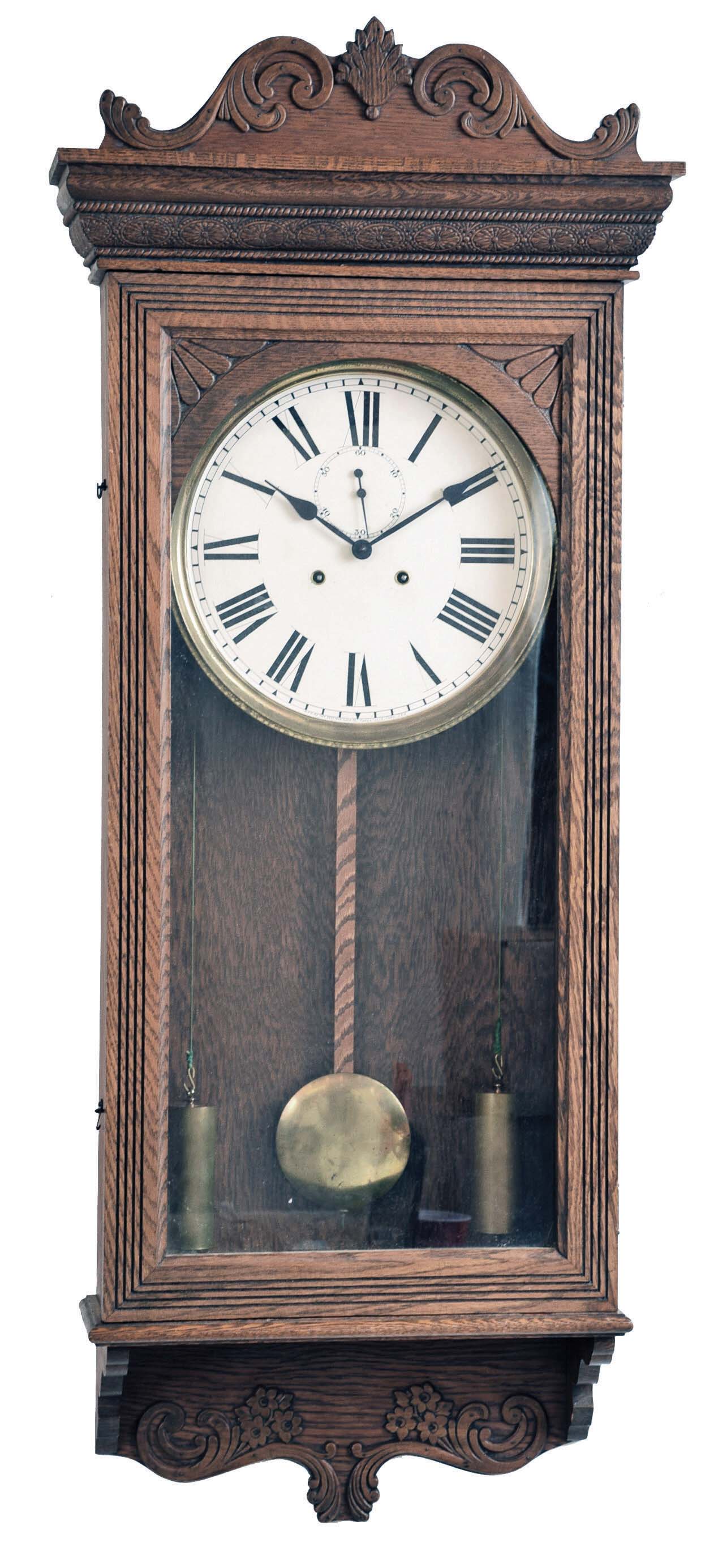 Sessions Clock Co., Forestville, Conn., "Regulator No. 5" wall hanging clock with an 8 day weight driven brass timepiece movement in a sold oak case. — Antique Clocks Price Guide