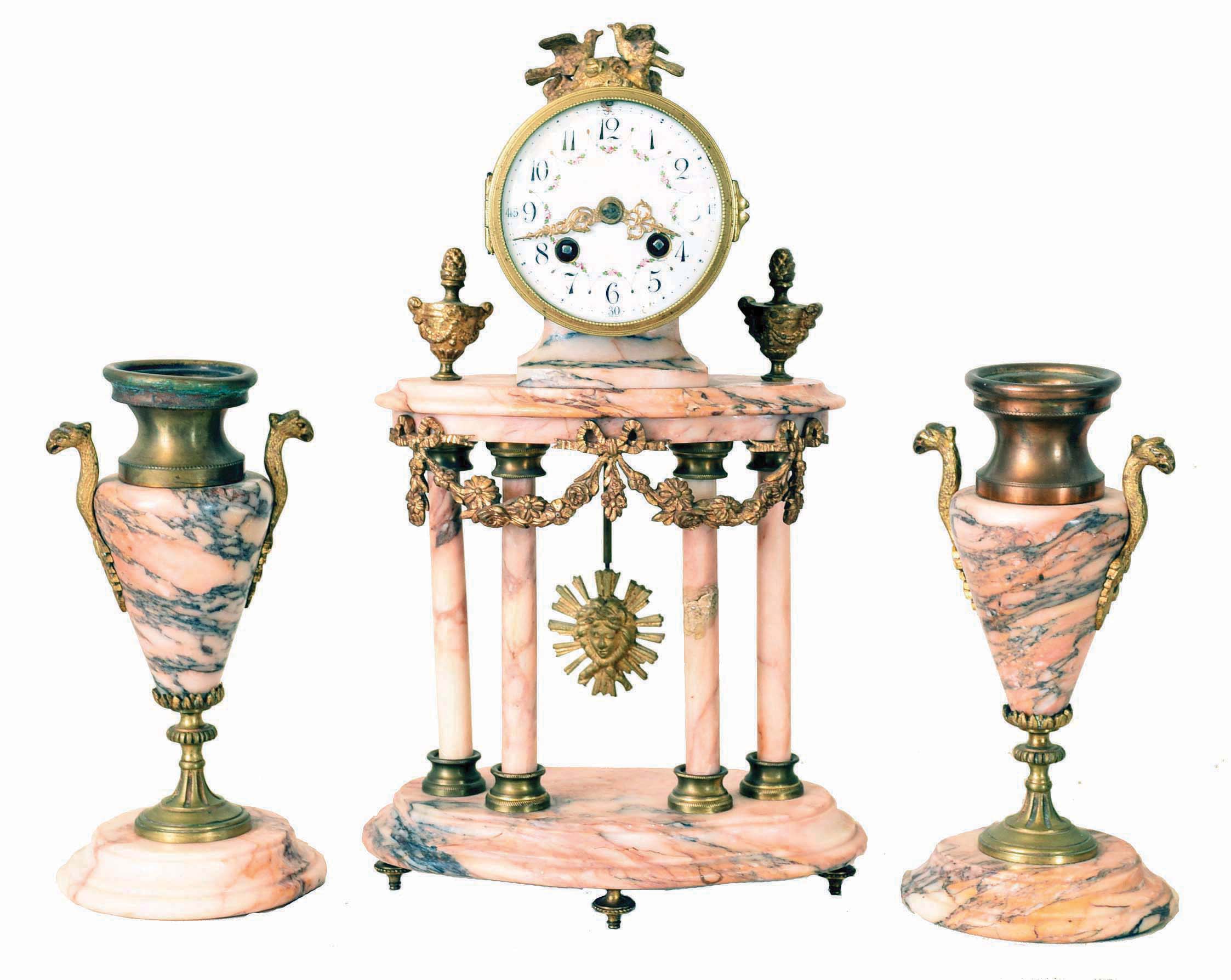 France, mantel clock with garniture, pink variegated portico style clock with gilt ornament, Arabic numeral white enamel dial, gilt Louis XV style hands, Helios mask pendulum, 8 day time and strike pendule de Paris movement, with matching, vase form side pieces — Antique Clocks Price Guide