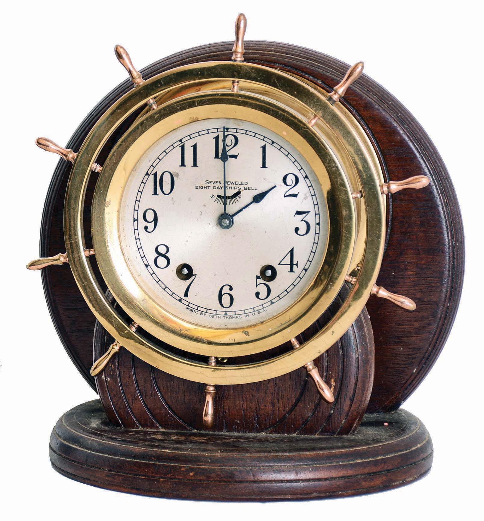 Seth Thomas Clock Co., Thomaston, Conn., "Ship's Wheel", 8 days, time and strike spring brass lever movement Ship's Bell clock. — Antique Clocks Price Guide