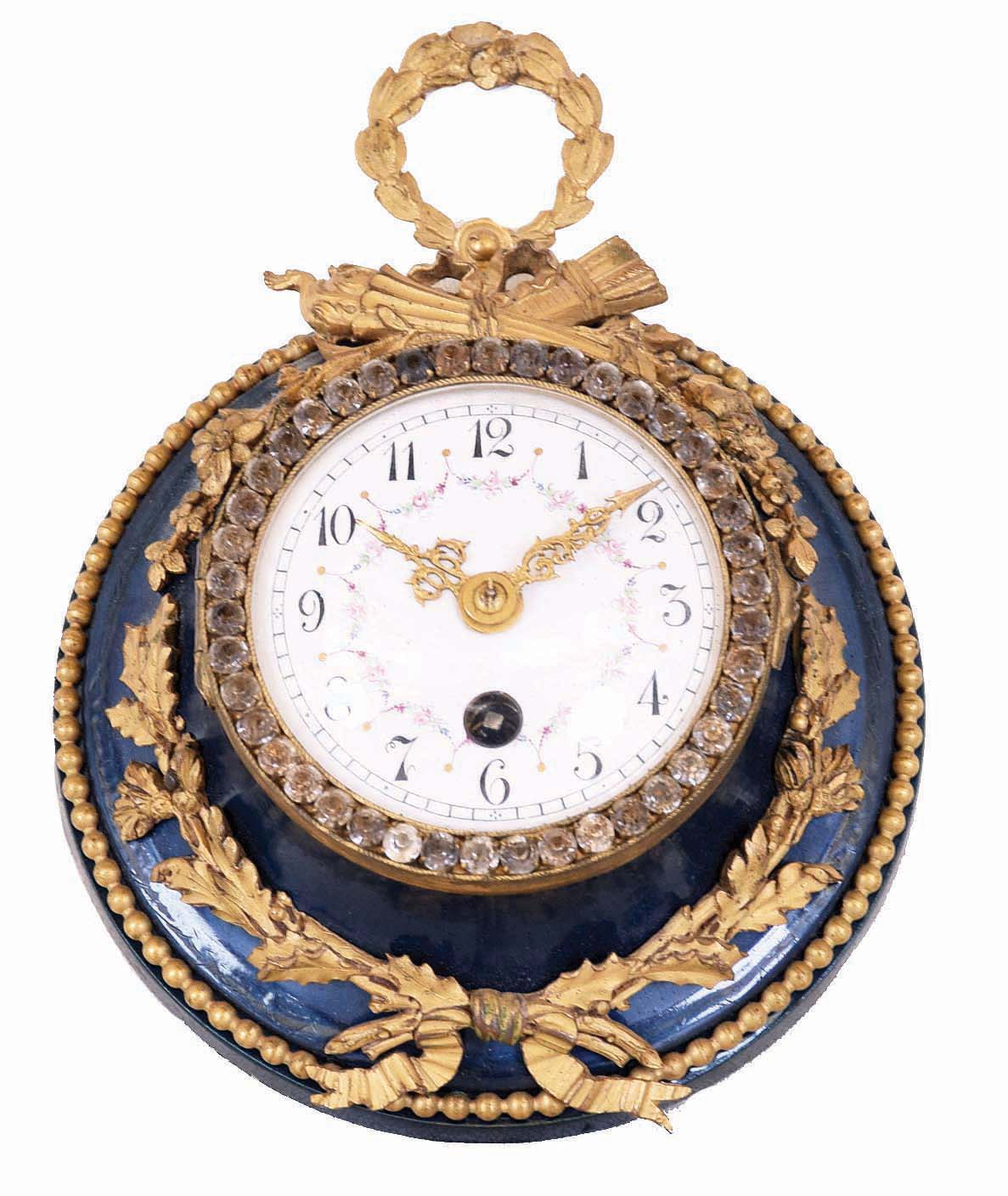 Clocks- 2 (Two) French 8 day balance wheel clocks: cast brass time and strike small mantel clock with barometer on top and side thermometers; small watch- form time only hanging clock with blue finish and cast brass accents — Antique Clocks Price Guide