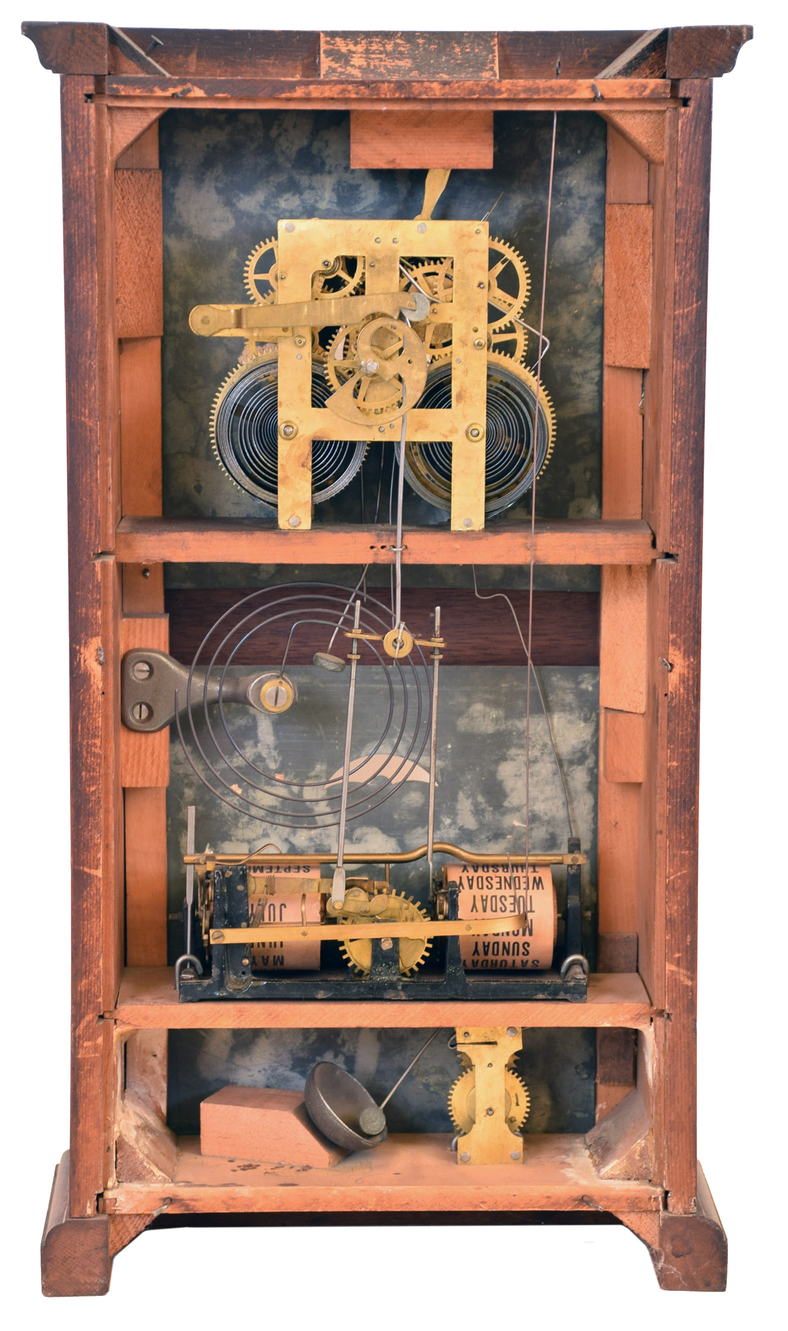 Ithaca Calendar Clock Co., Ithaca, NY. "No. 10 Farmer's" shelf clock with an 8 day spring driven time, strike and alarm brass movement and a standard Ithaca perpetual calendar mechanism in a walnut case. — Antique Clocks Price Guide
