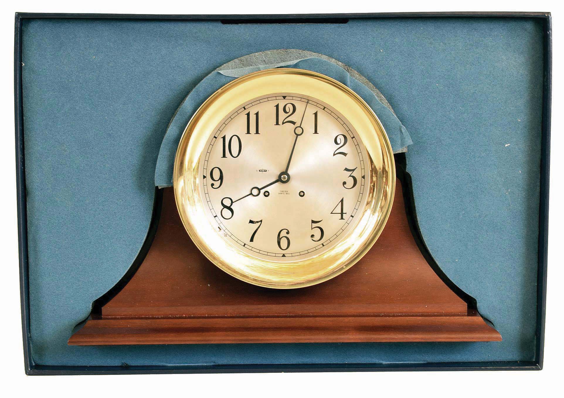 Chelsea Clock Co., Boston, Mass., No. 2093M 8 1/2" hinge bezel ship's bell brass clock on hardwood base in original presentation box and with original papers — Antique Clocks Price Guide