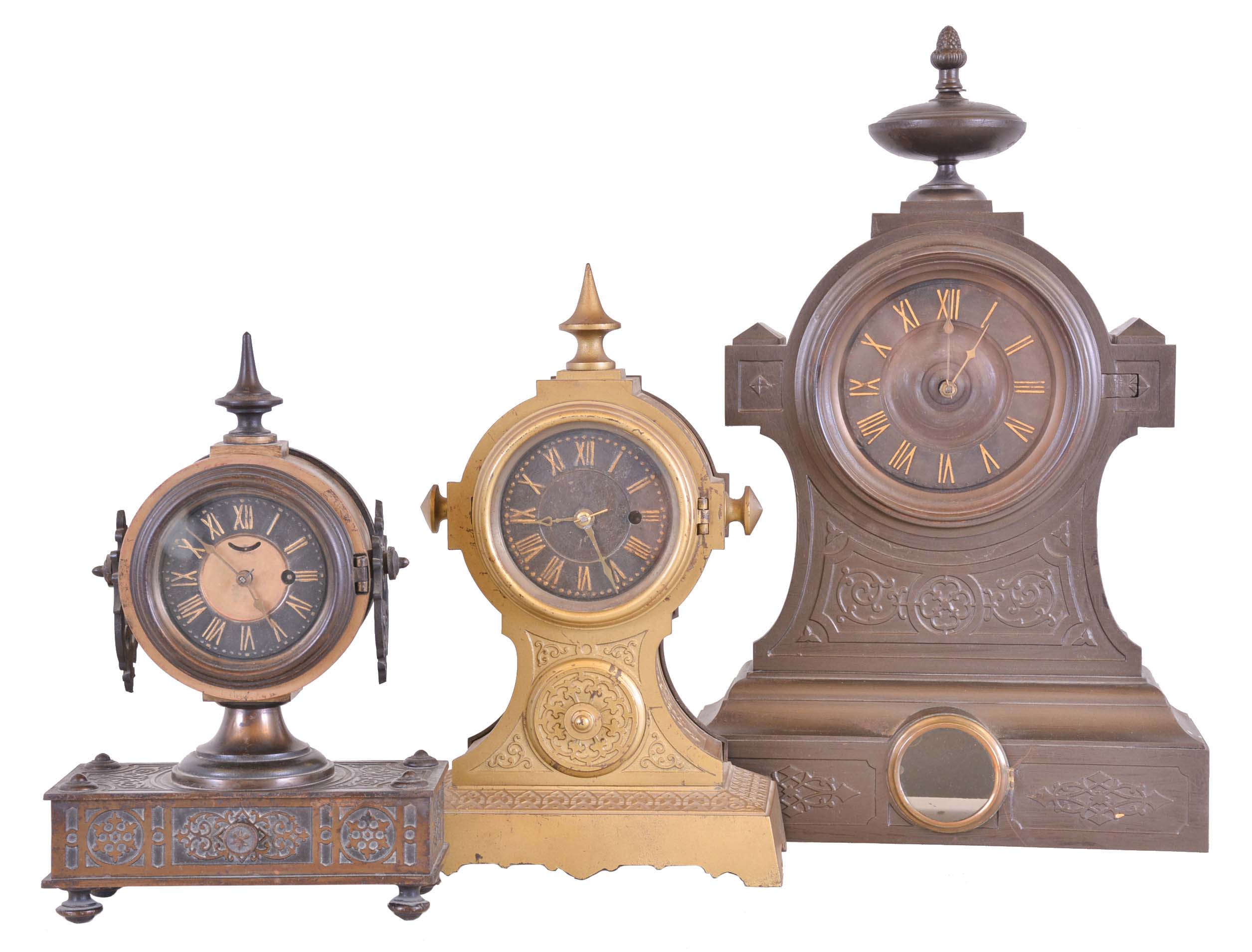 Clocks- 3 (Three): (1) American Clock Co., New York "Tucker Bronze", 30 hour, spring brass movement shelf clock. (2) Ansonia Brass & Copper Co., Ansonia, Conn. "Tucker No. 2", 30 hour, spring brass lever movement shelf clock. (3) American Clock Co., New York, "Tucker Bronze", 8 day, time and strike spring brass movement iron case shelf clock. — Antique Clocks Price Guide