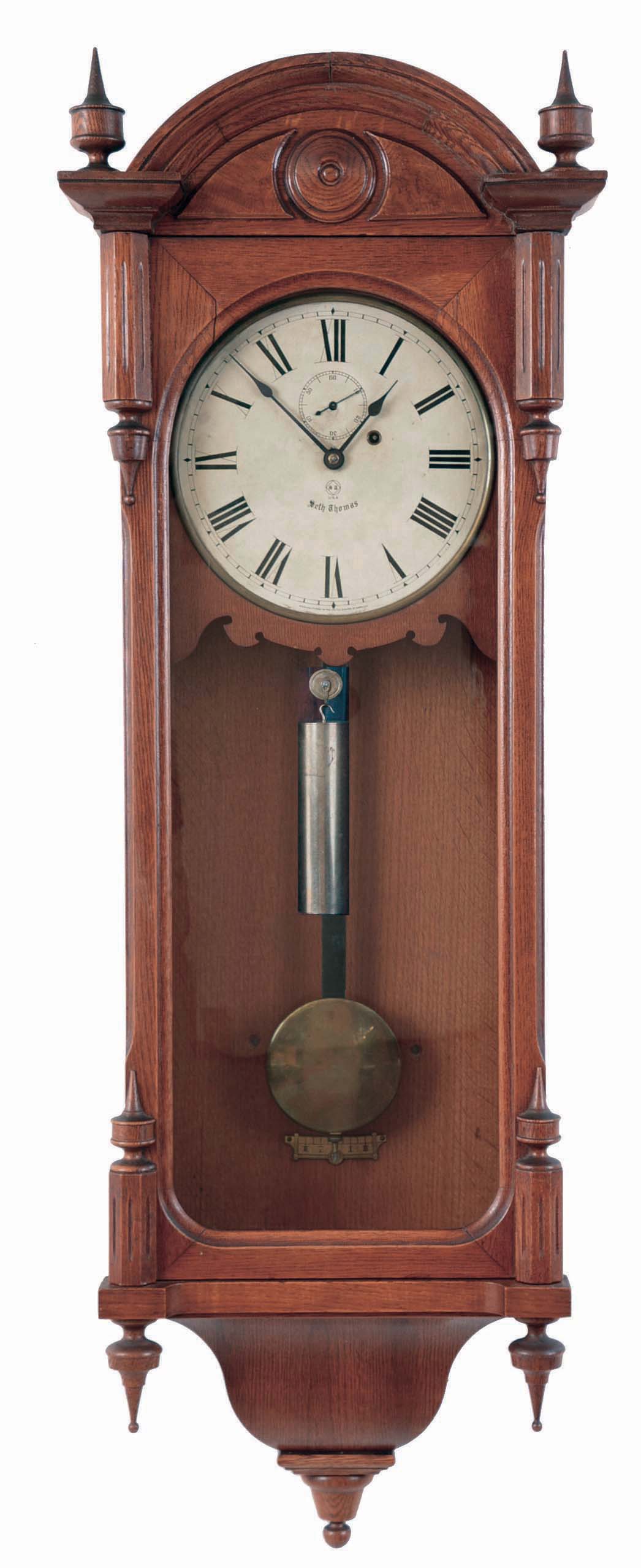 Seth Thomas Clock Co., Thomaston, Conn., "Regulator No. 6" with a weight driven 8 day timepiece movement in an oak case — Antique Clocks Price Guide