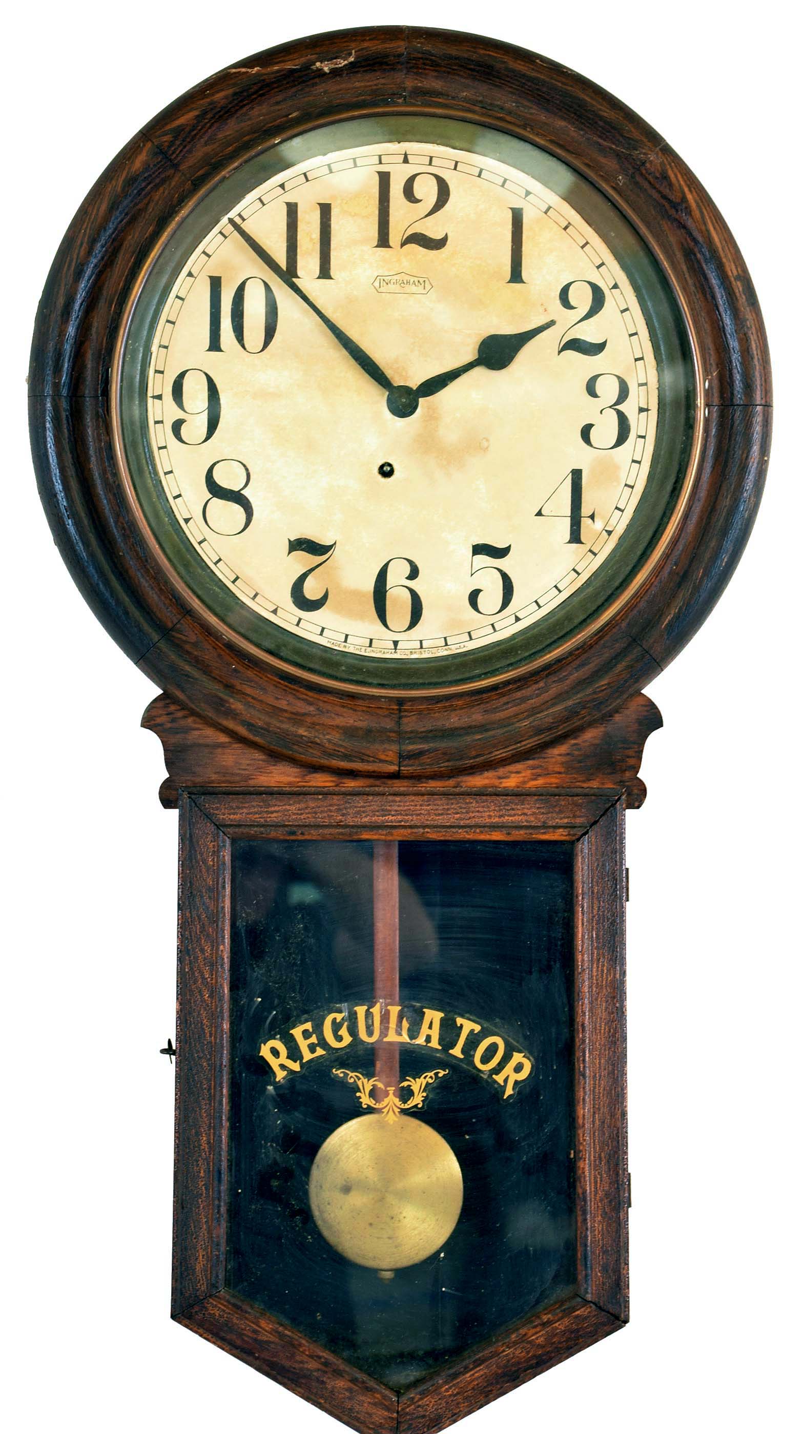 Clocks- 2 (Two): (1) Ingraham Clock Co., Bristol, Conn., "Postal" hanging wall clock with a spring driven 8 day movement in a solid oak case, c1911. (2) Ansonia Clock Co., New York, "Regulator A" wall hanging clock with an 8 day spring driven timepiece movement in an ash case, c1906. — Antique Clocks Price Guide