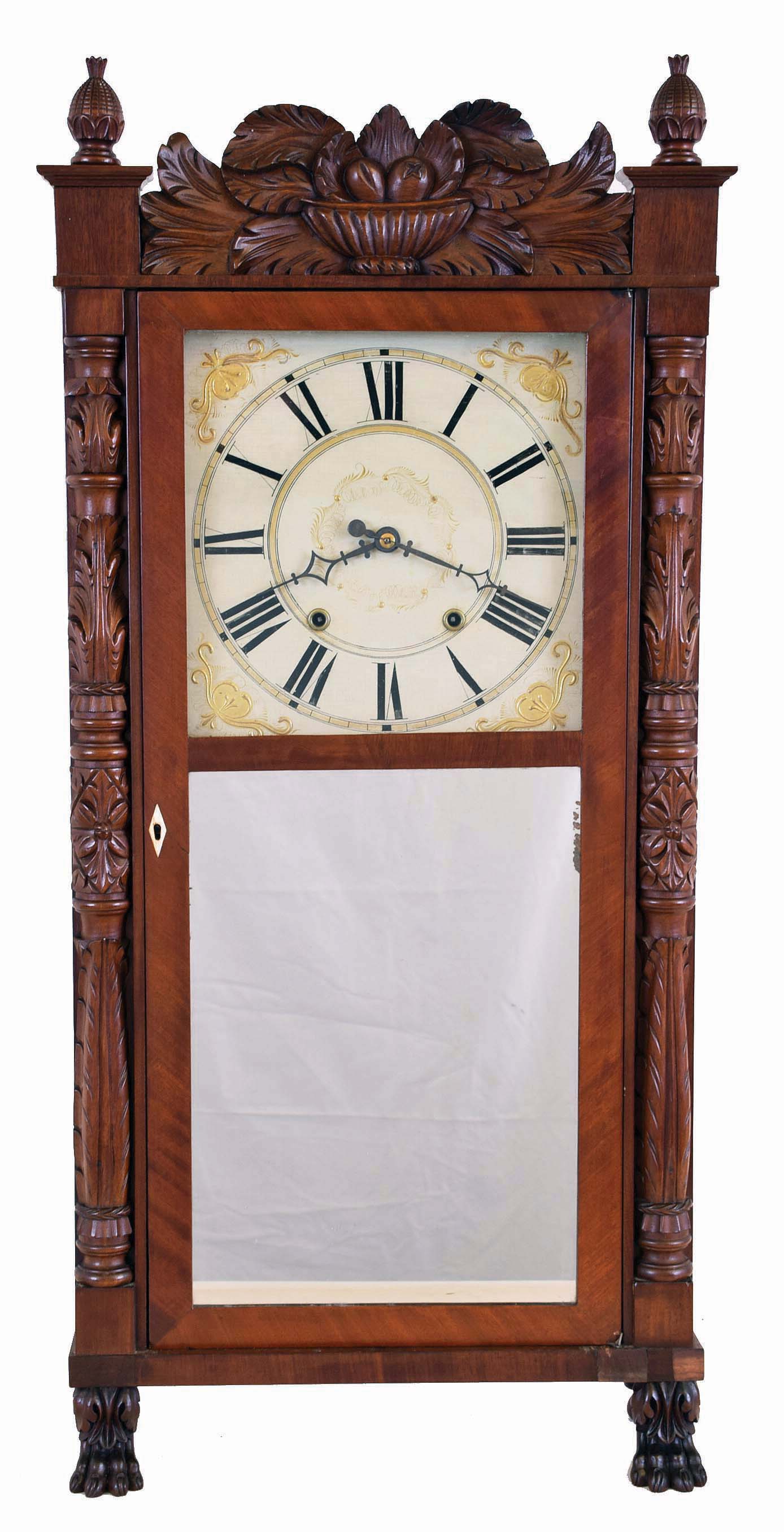 Ephraim Downs, Bristol, Conn. Tall Empire shelf clock with mahogany case and fully carved half columns, splat, pineapple finials and paw feet with a 30 hour weight driven time and strike wood movement, — Antique Clocks Price Guide
