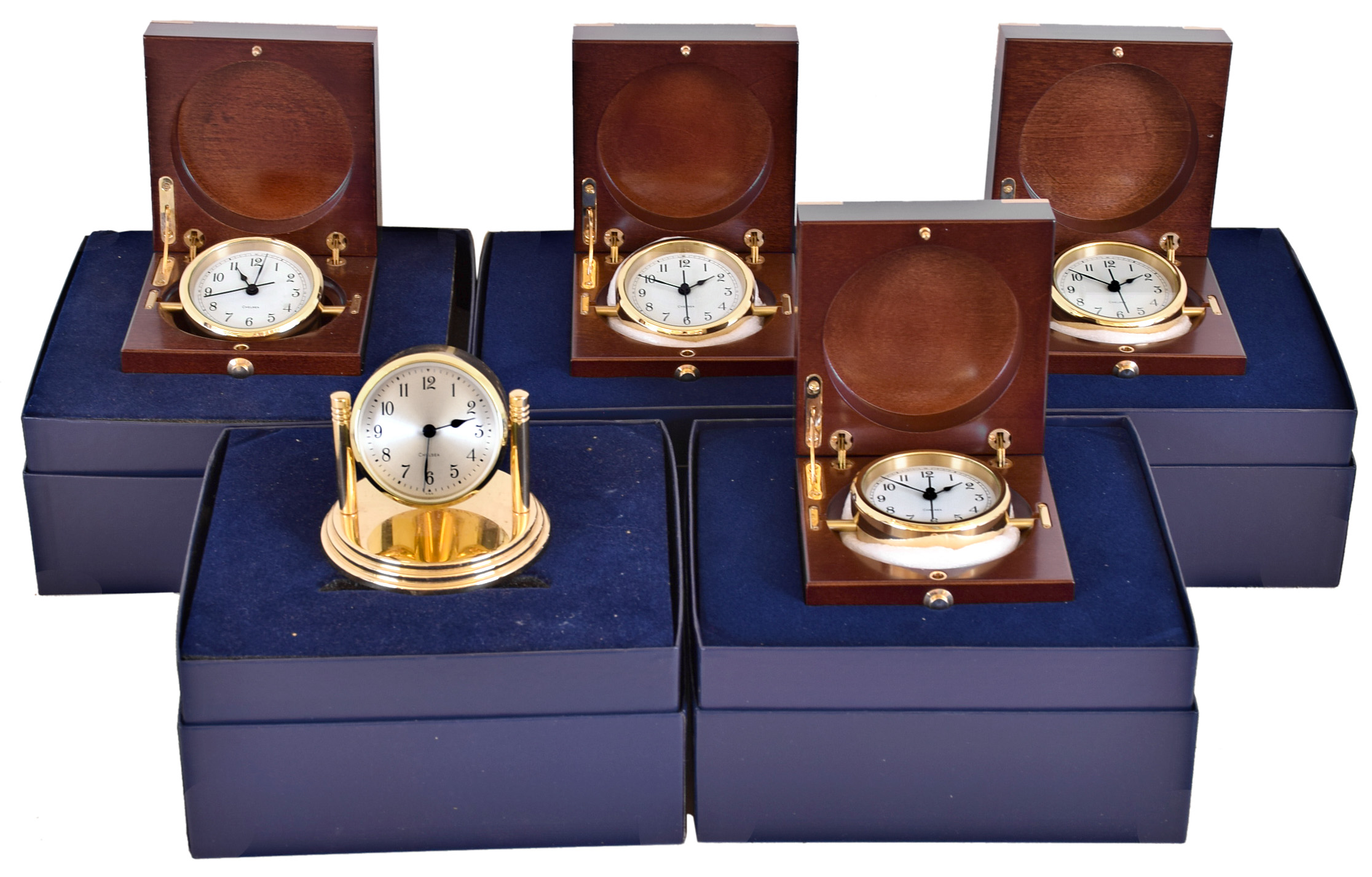 Clocks- 5 (Five) Chelsea Clock Company quartz movement lacquered brass desk clocks, new / old stock: four #20979 "Boardroom Clock" tilt in hinged fitted wood deckwatch boxes ; one #20989 "Dartmouth" in tilting brass stand — Antique Clocks Price Guide
