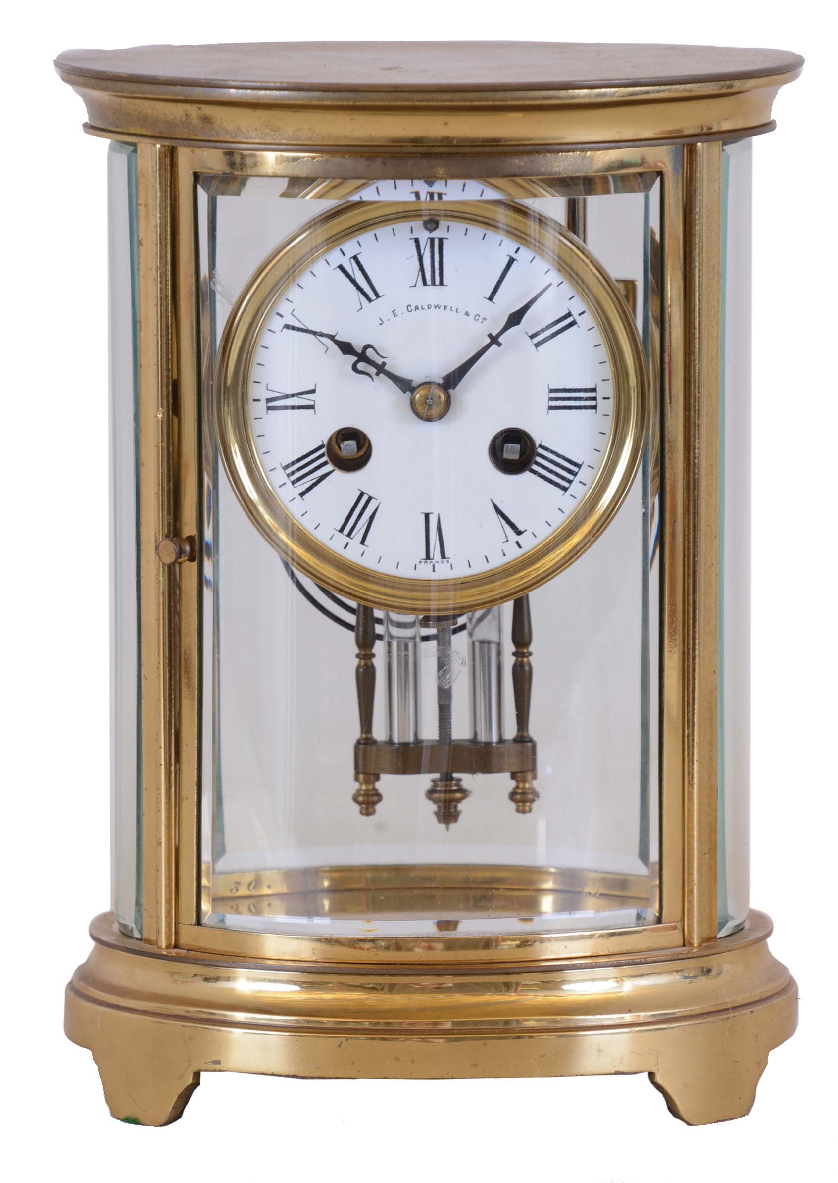 French, CH. Hour, 8 day, time and strike spring brass movement crystal regulator in oval case retailed by J.E. Caldwell & Co. — Antique Clocks Price Guide