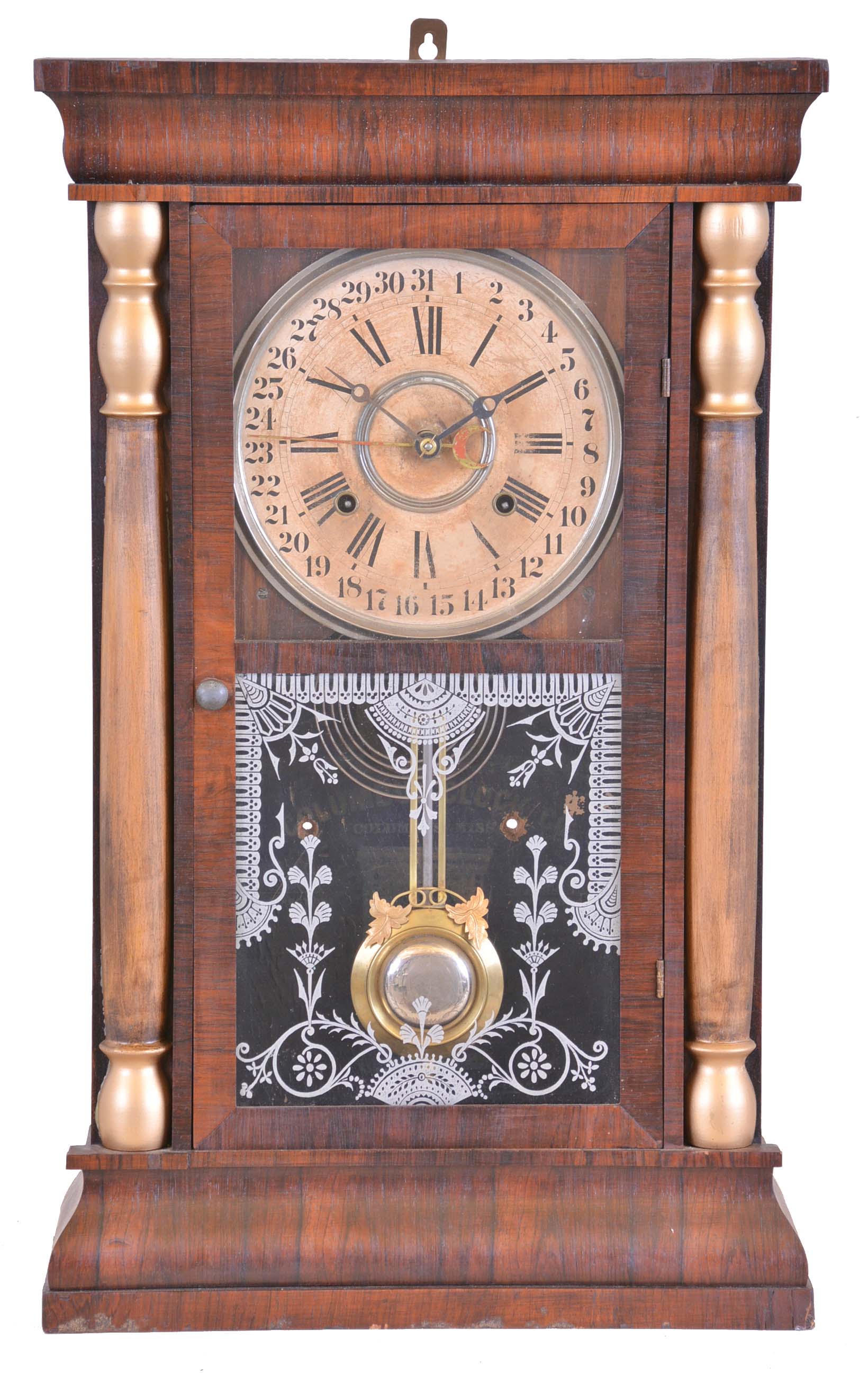 Columbus Clock Co., Columbus, Miss., 8 day, time and strike spring brass movement column calendar clock. — Antique Clocks Price Guide