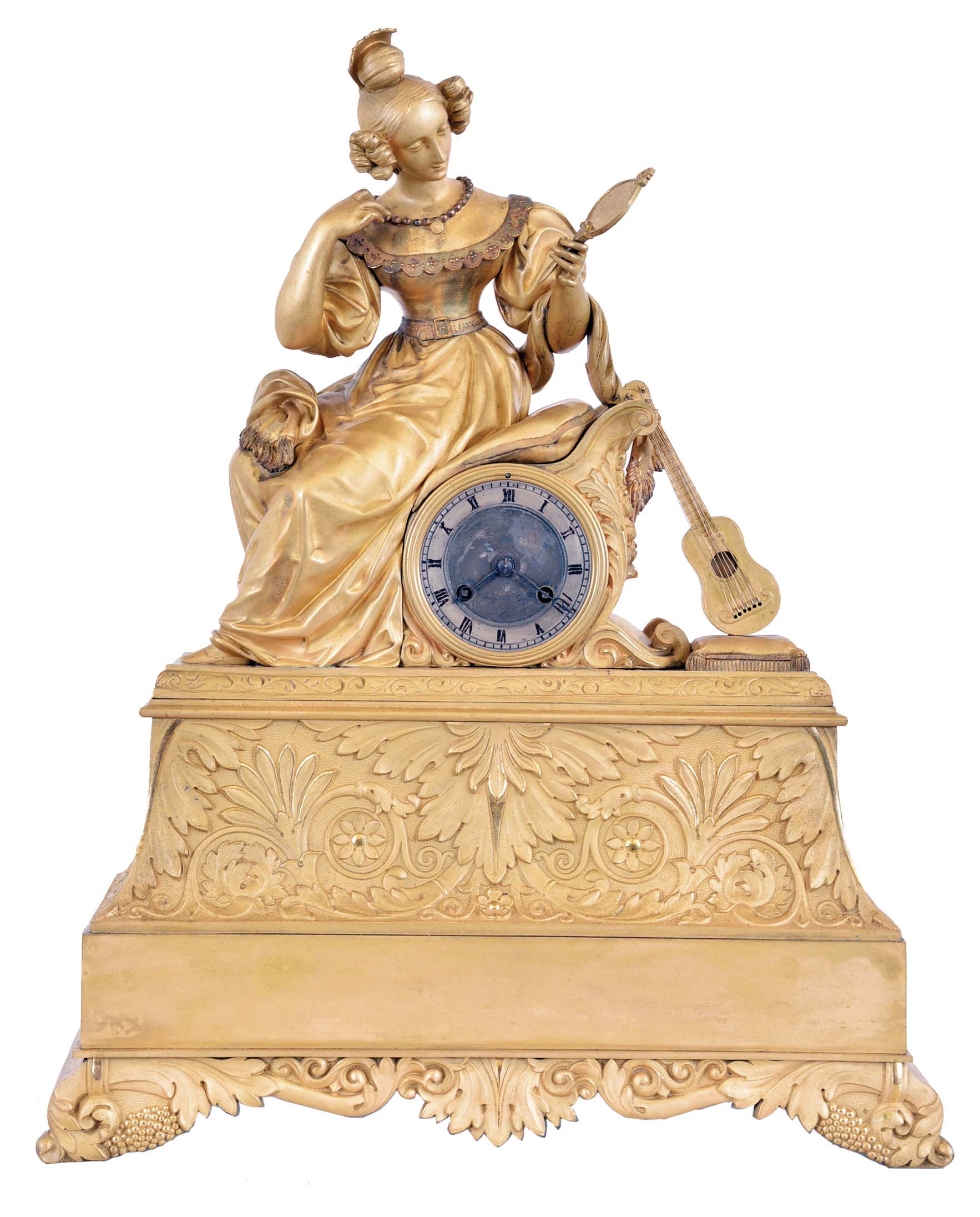 France, a Louis Philippe gilt bronze mantel clock, the case with bright and matte surfaces and decorated with Grecian ornament, surmounted by a figure of a seated young woman with fashionable hairstyle, comb, and dress, admiring her reflection in a hand mirror, and with a parlor guitar to her left, signed, Roman numeral silvered dial, blued steel Breguet style hands, 8 day time and strike pendule de Paris movement with silk thread suspension, signed "Pons" — Antique Clocks Price Guide