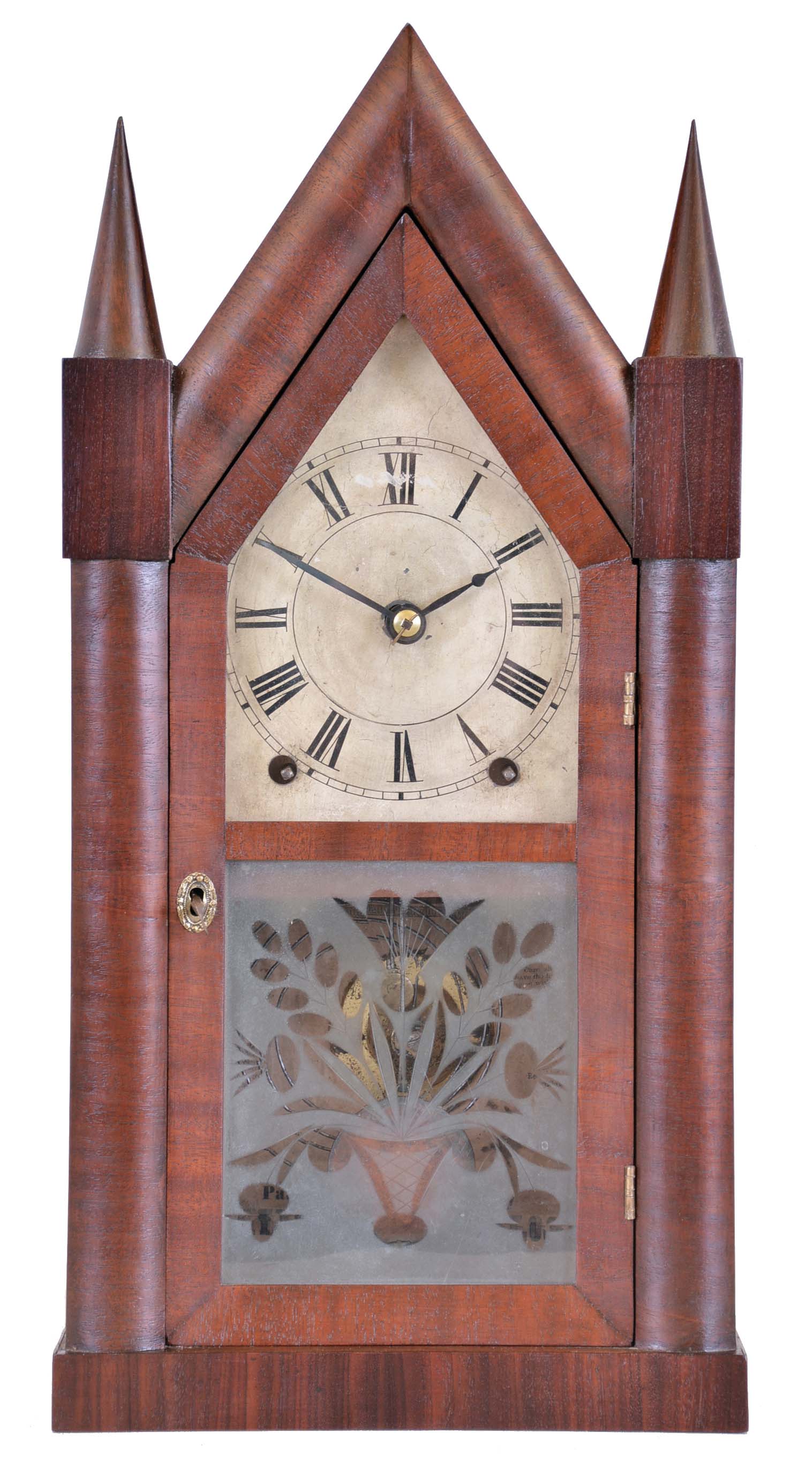 Brewster & Ingrahams, Bristol, Conn., Sharp Gothic or steeple shelf clock with a spring driven 8 day time and strike movement in a mahogany veneered case. — Antique Clocks Price Guide