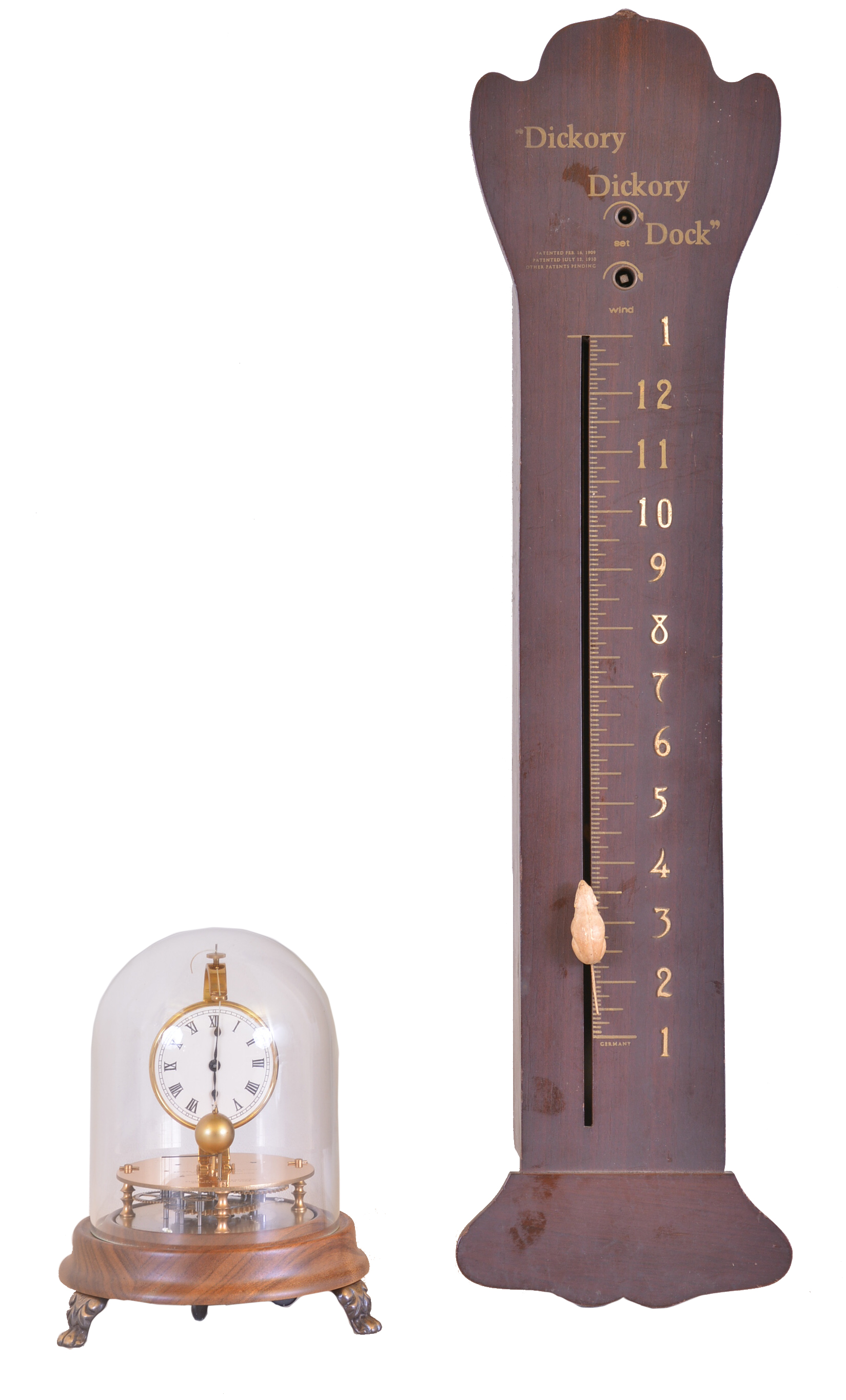 Clocks- 2 (Two): (1) Horolovar Clock Co., Bronxville, New York, "Dickory, Dickory, Dock", 8 day, time spring brass lever movement reproduction mouse clock, c1970 (2) Horolovar Clock Co., Bronxville, New York, "Briggs Rotary", 8 day, time spring brass movement reproduction novelty timepiece, c1980 — Antique Clocks Price Guide