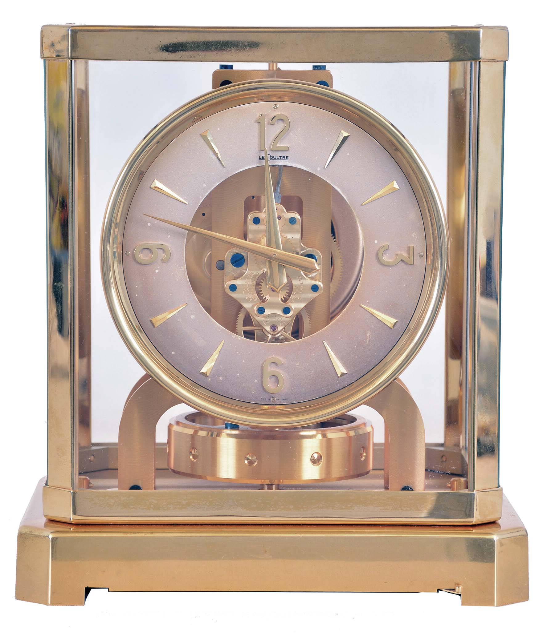 LeCoultre, Switzerland, Atmos clock, glazed, gilt brass case, silvered Arabic numeral and arrow marker dial, 15 jewel caliber 519 movement, serial #37110 — Antique Clocks Price Guide